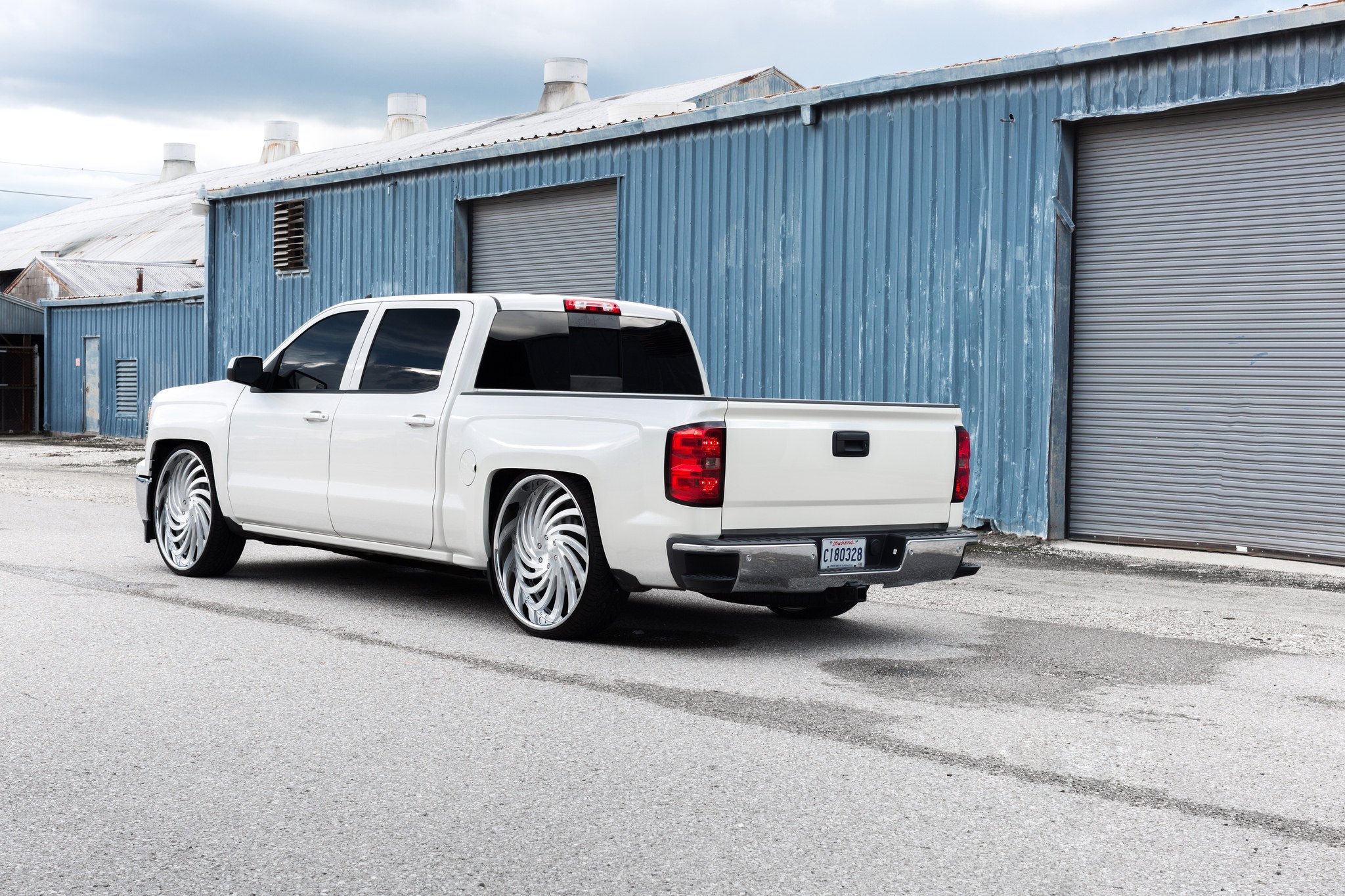 Red LED Taillights on White Chevy Silverado - Photo by Dub Wheels