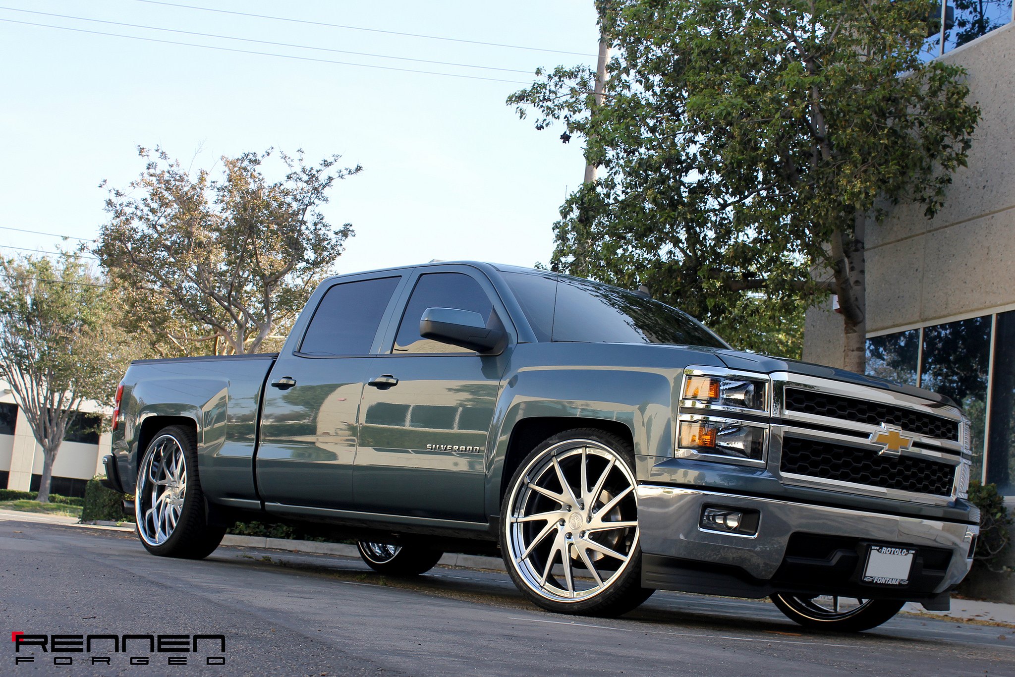 Gray Chevy Silverado with Chrome Grille - Photo by Rennen International