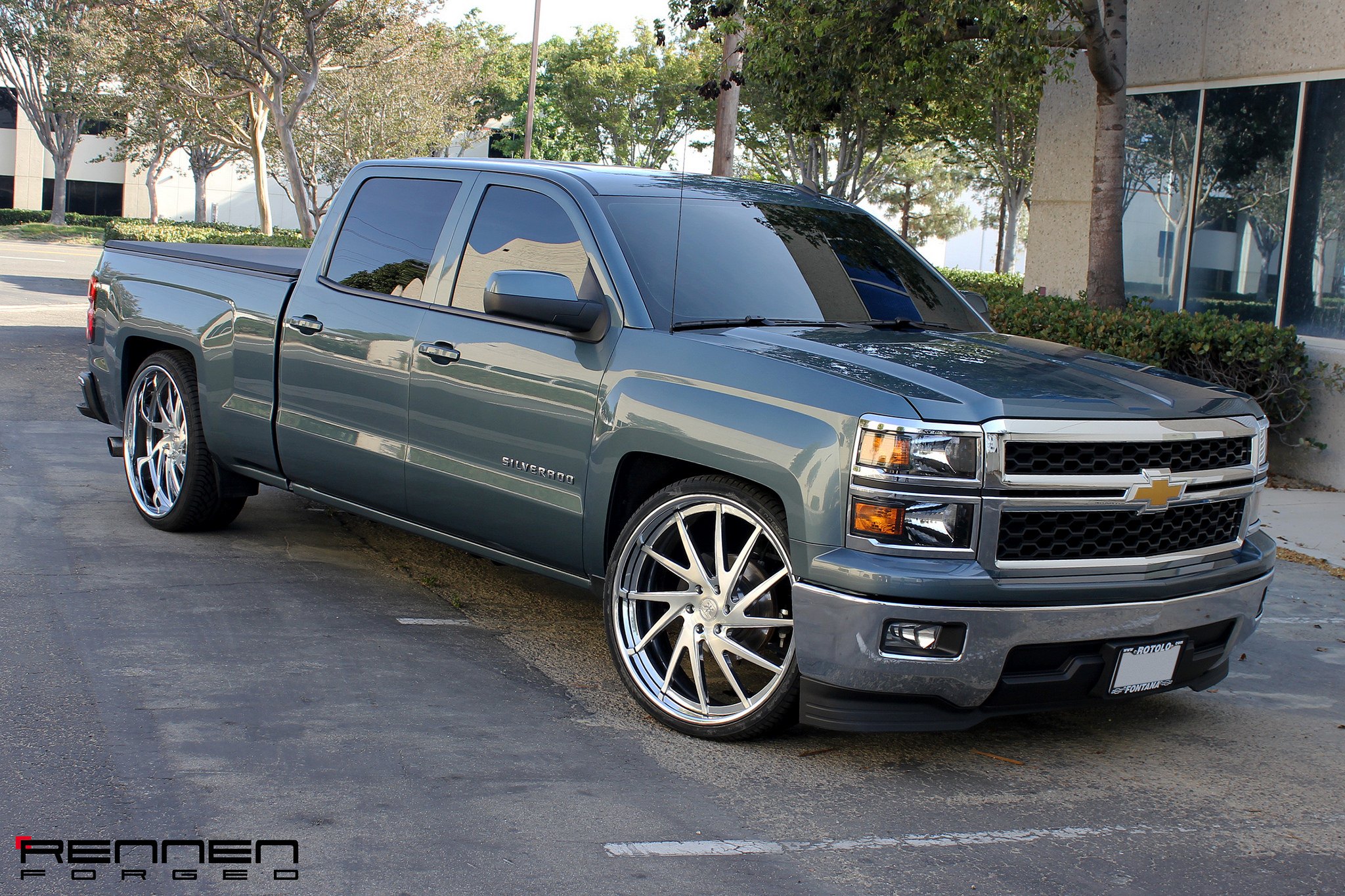 Front Bumper with Fog Lights on Gray Chevy Silverado - Photo by Rennen International