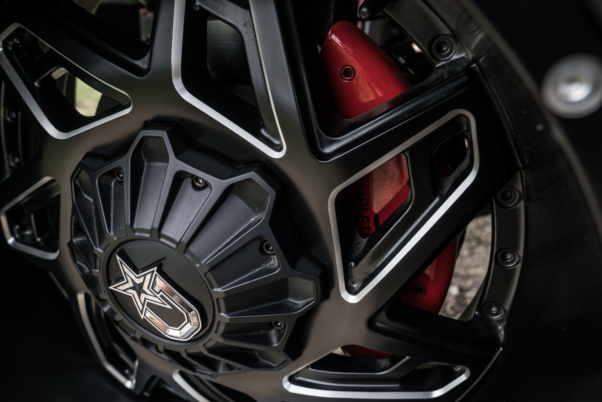 Matte Black Custom Wheels on Lifted Chevy Silverado Z71 - Photo by Dropstar
