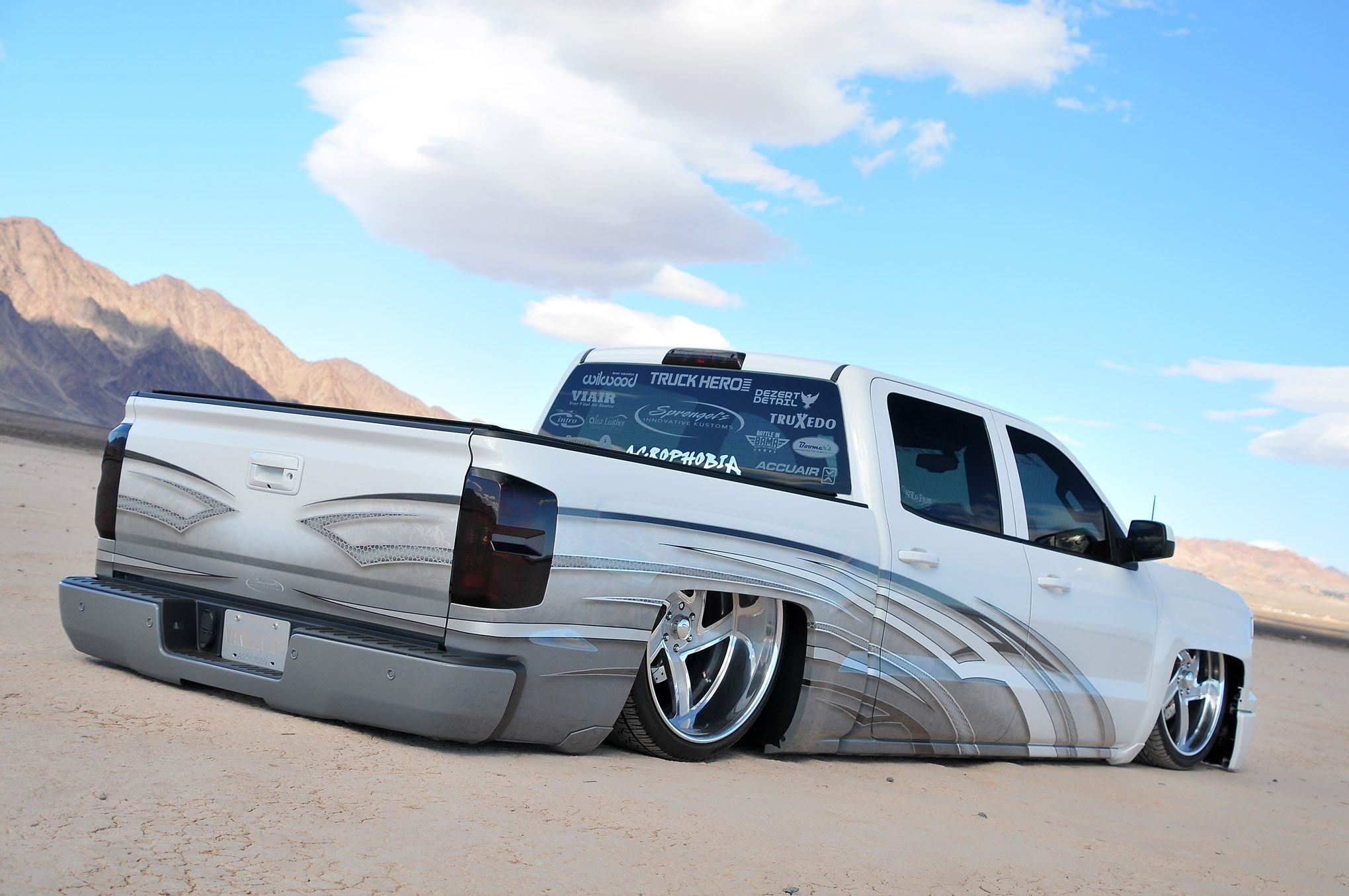 White Lowered Chevy Silverado with Red Smoke Taillights - Photo by Phil Gordon