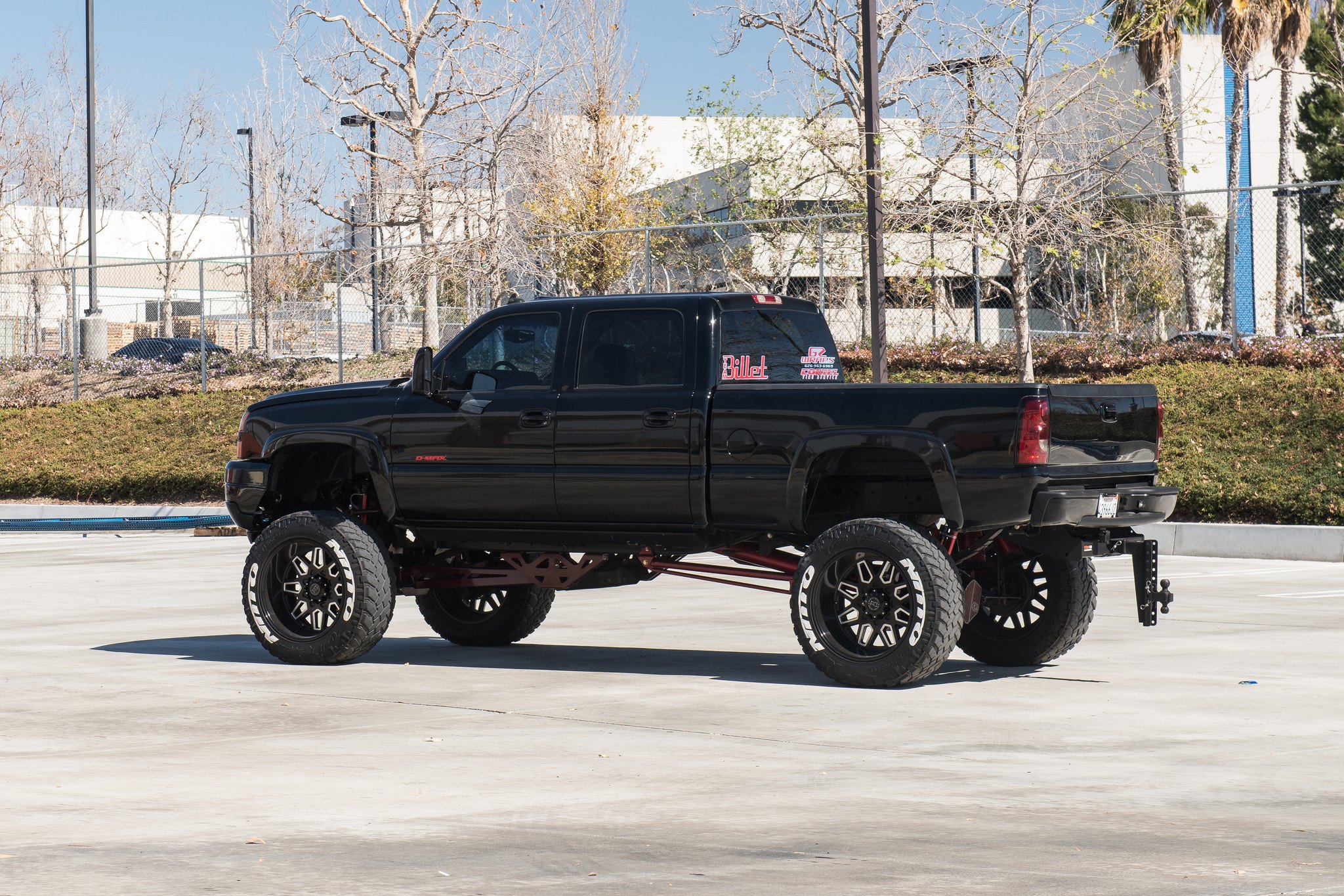 Black Lifted Chevy Silverado with Red LED Taillights - Photo by Black Rhino