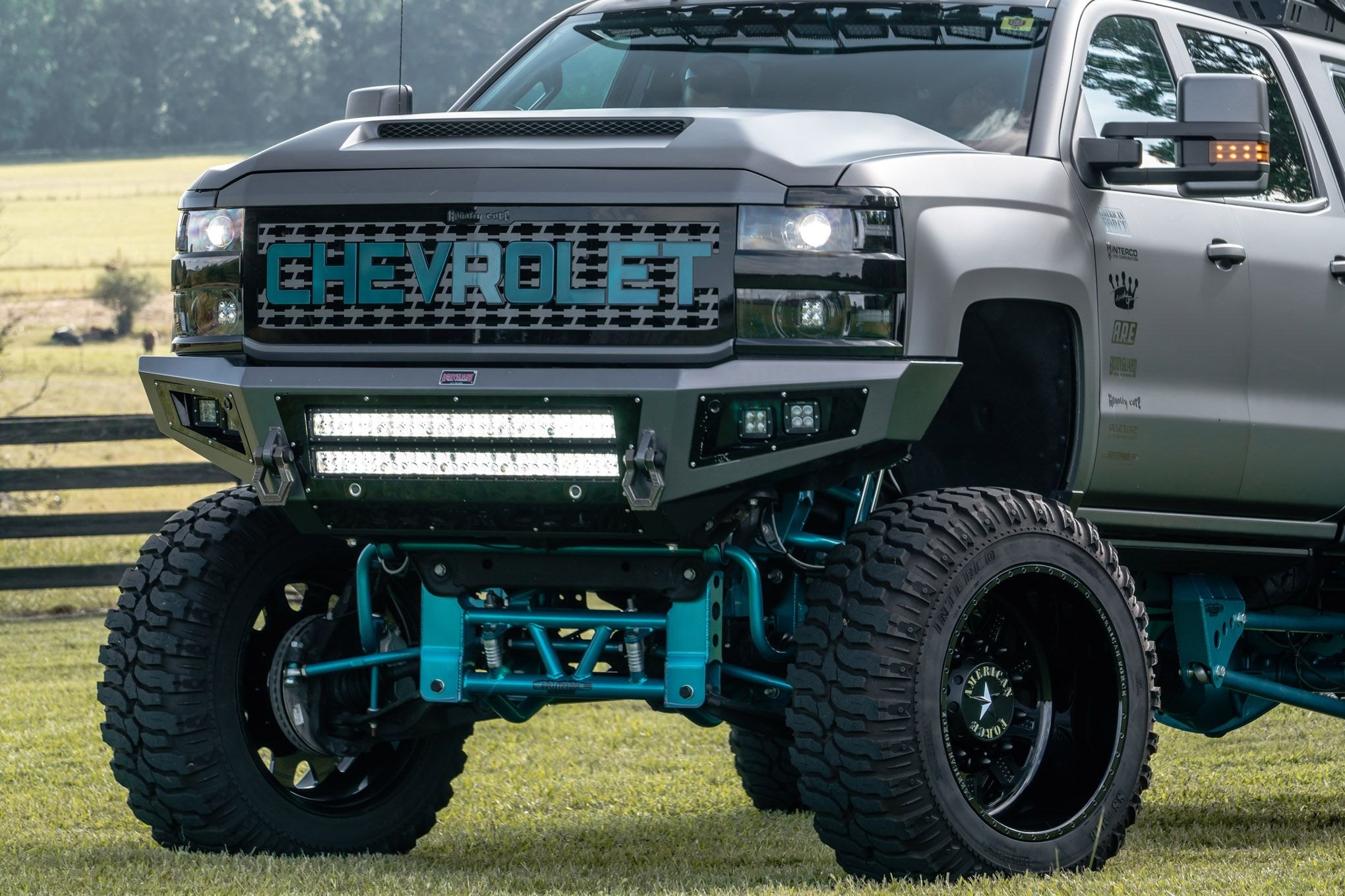 Gray Lifted Chevy Silverado with Custom Royalty Core Grille - Photo by Buddy Hernandez