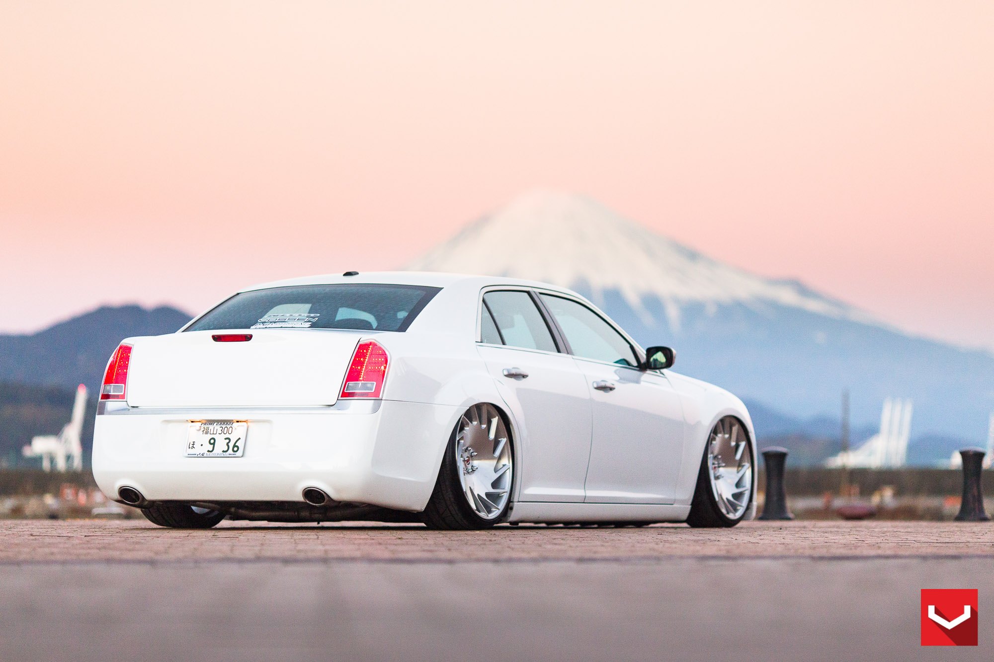Aftermarket Red LED Taillights on White Chrysler 300 - Photo by Vossen