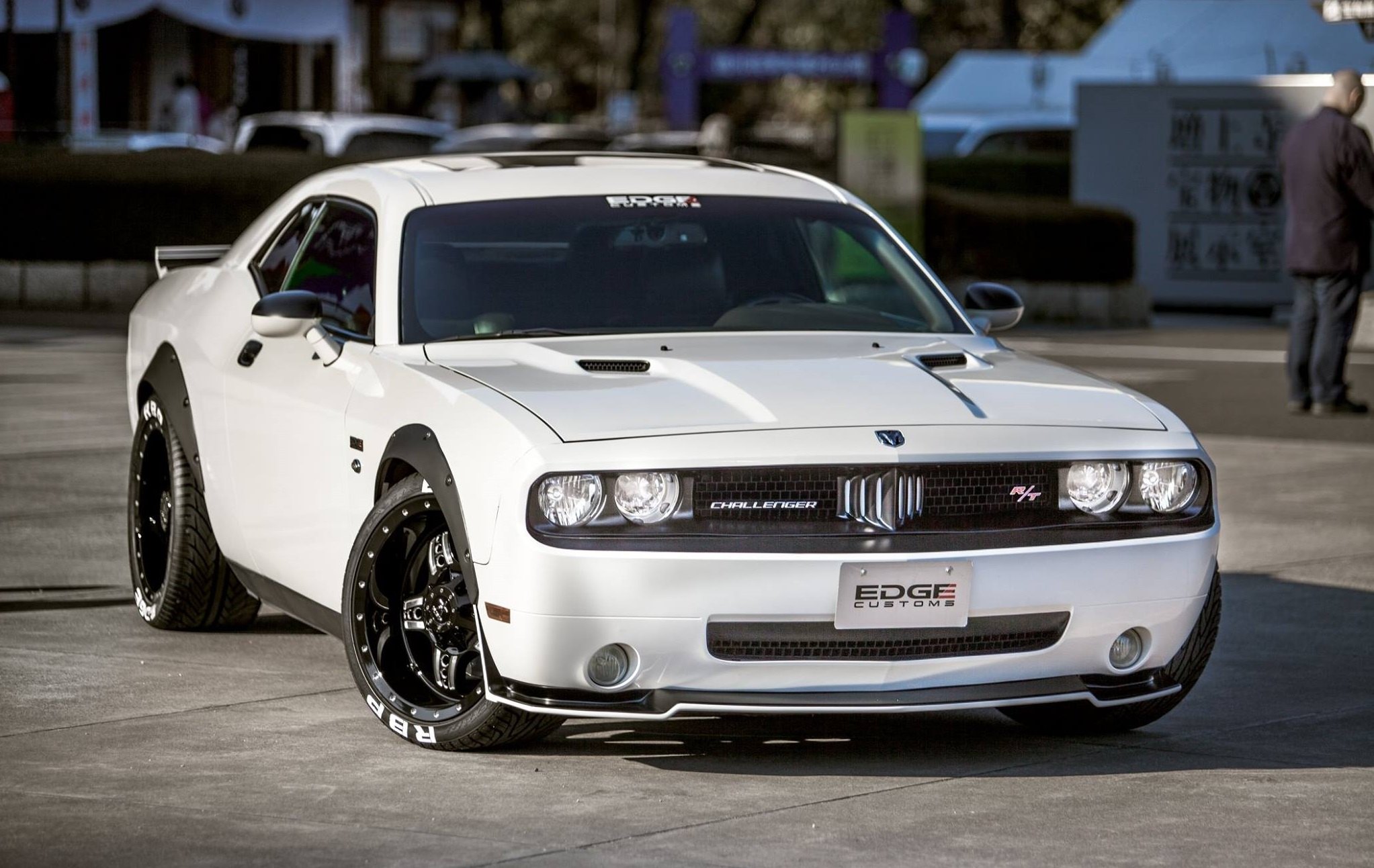 Unique Dodge Challenger With Wide Truck Wheels and Fender Flares - Photo by Edge Customs