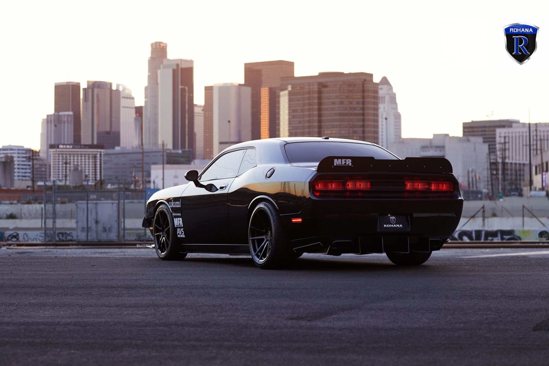 Black Dodge Challenger with Aftermarket Rear Spoiler - Photo by Rohana Wheels