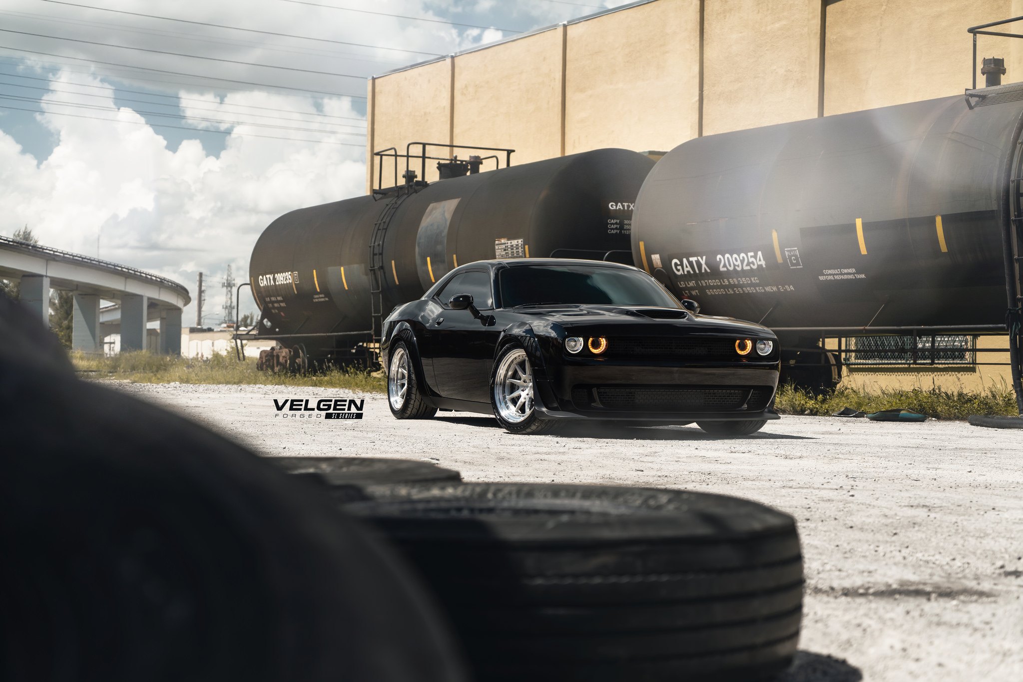 Black Dodge Challenger with Aftermarket Front Bumper - Photo by Velgen Wheels