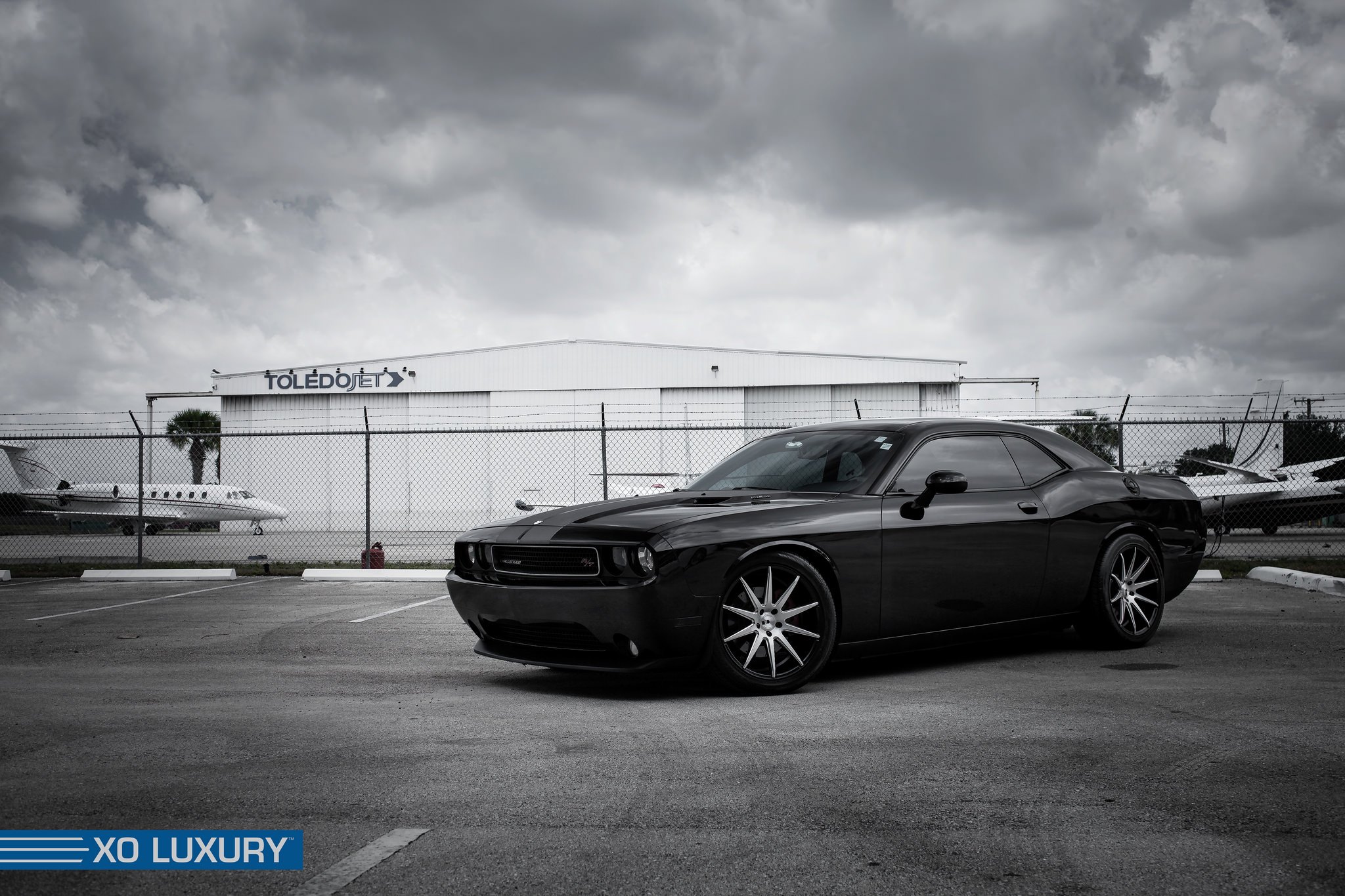 Black Dodge Challenger With Matte Black Stripes - Photo by XO Luxury