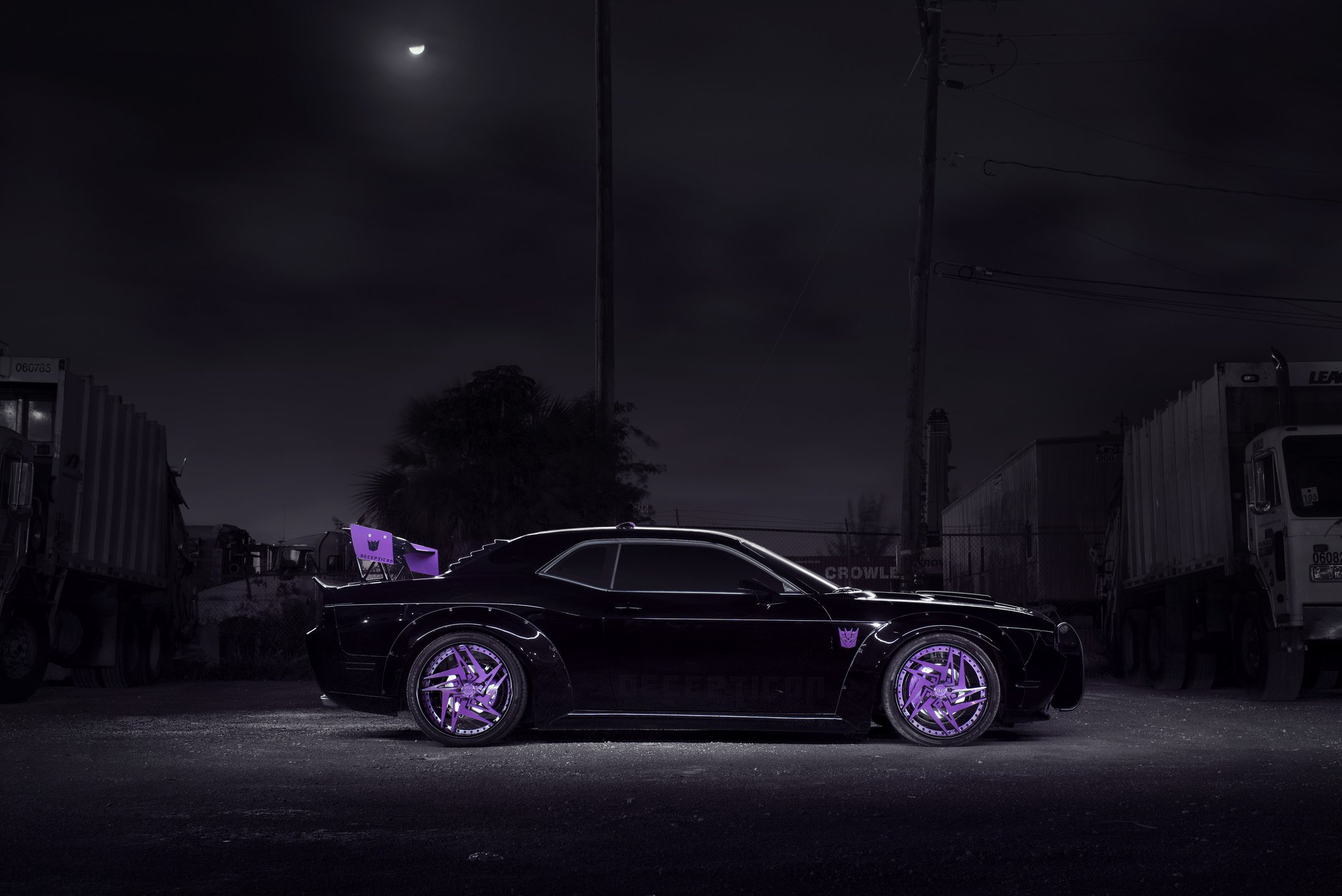 Lowered Black Dodge Challenger with Fender Flares - Photo by DUB