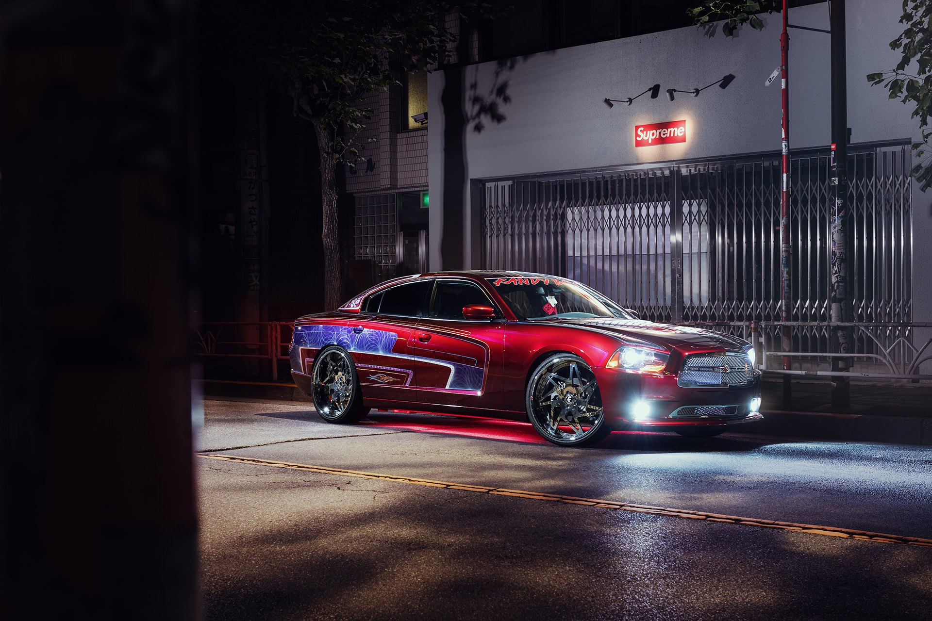Aftermarket Headlights on Red Dodge Charger - Photo by Forgiato