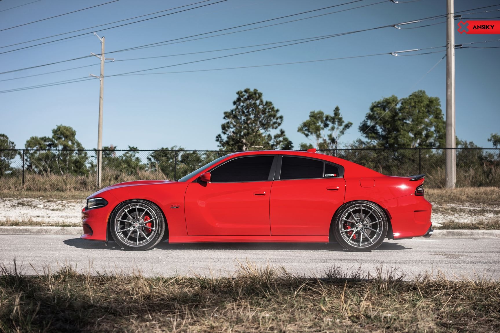 Satin Gunmetal Anrky Wheels on Red Dodge Charger - Photo by Anrky Wheels
