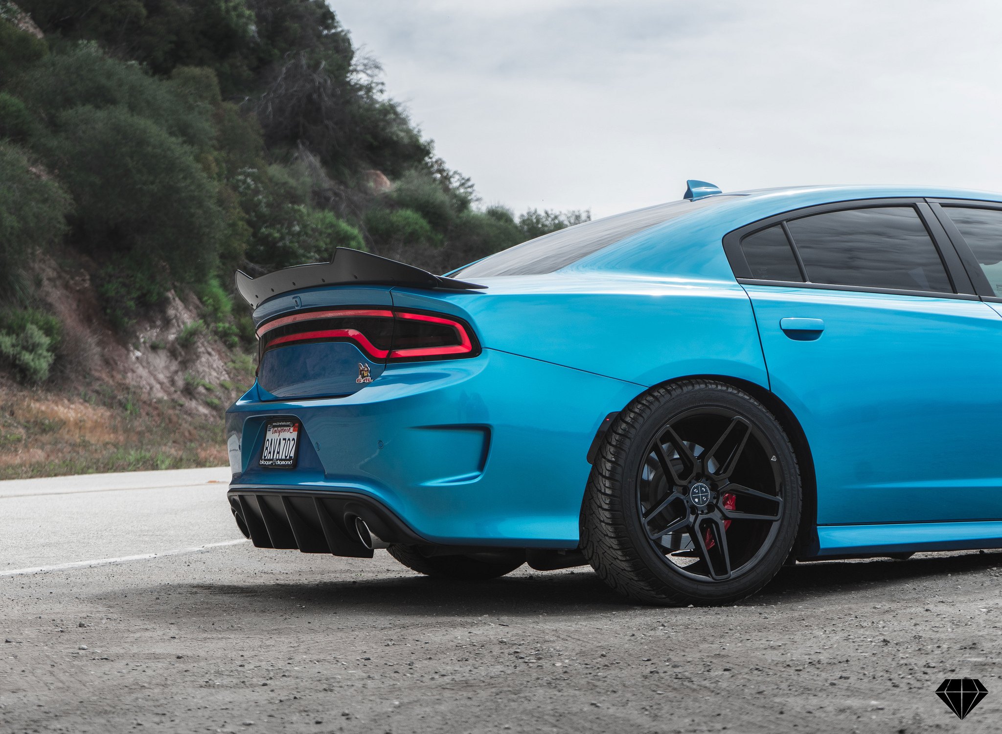 Aftermarket Rear Diffuser on Blue Dodge Charger - Photo by Blaque Diamond Wheels
