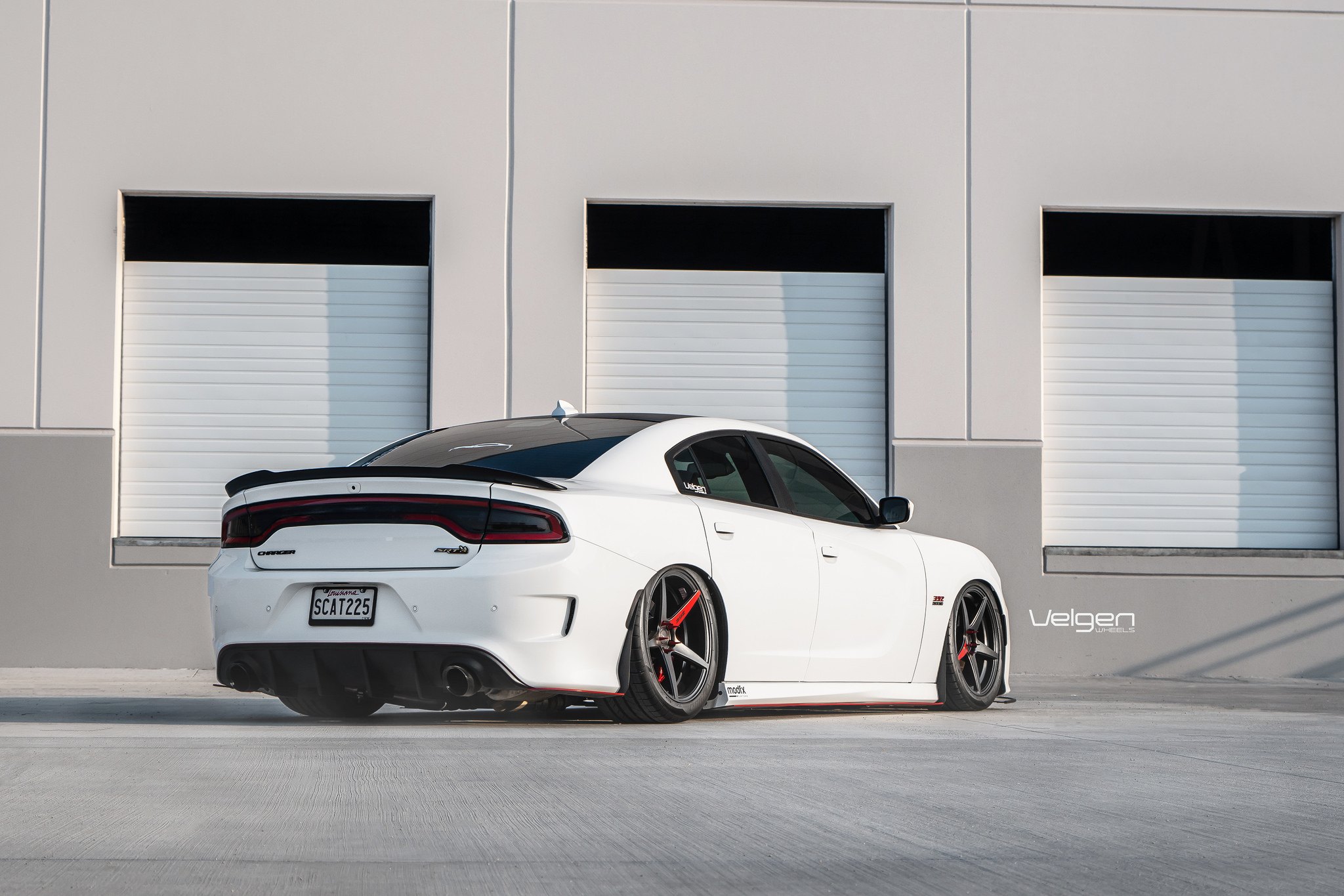 Aftermarket Rear Diffuser on White Dodge Charger - Photo by Velgen