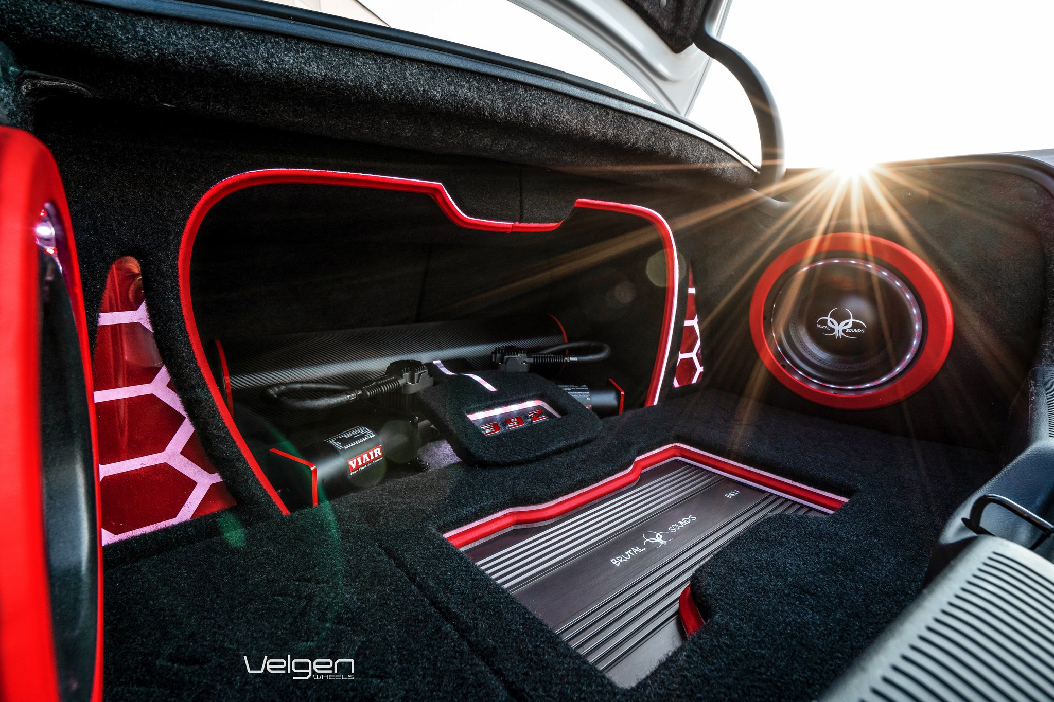 White Dodge Charger with Brutal Sounds Trunk Setup - Photo by Velgen