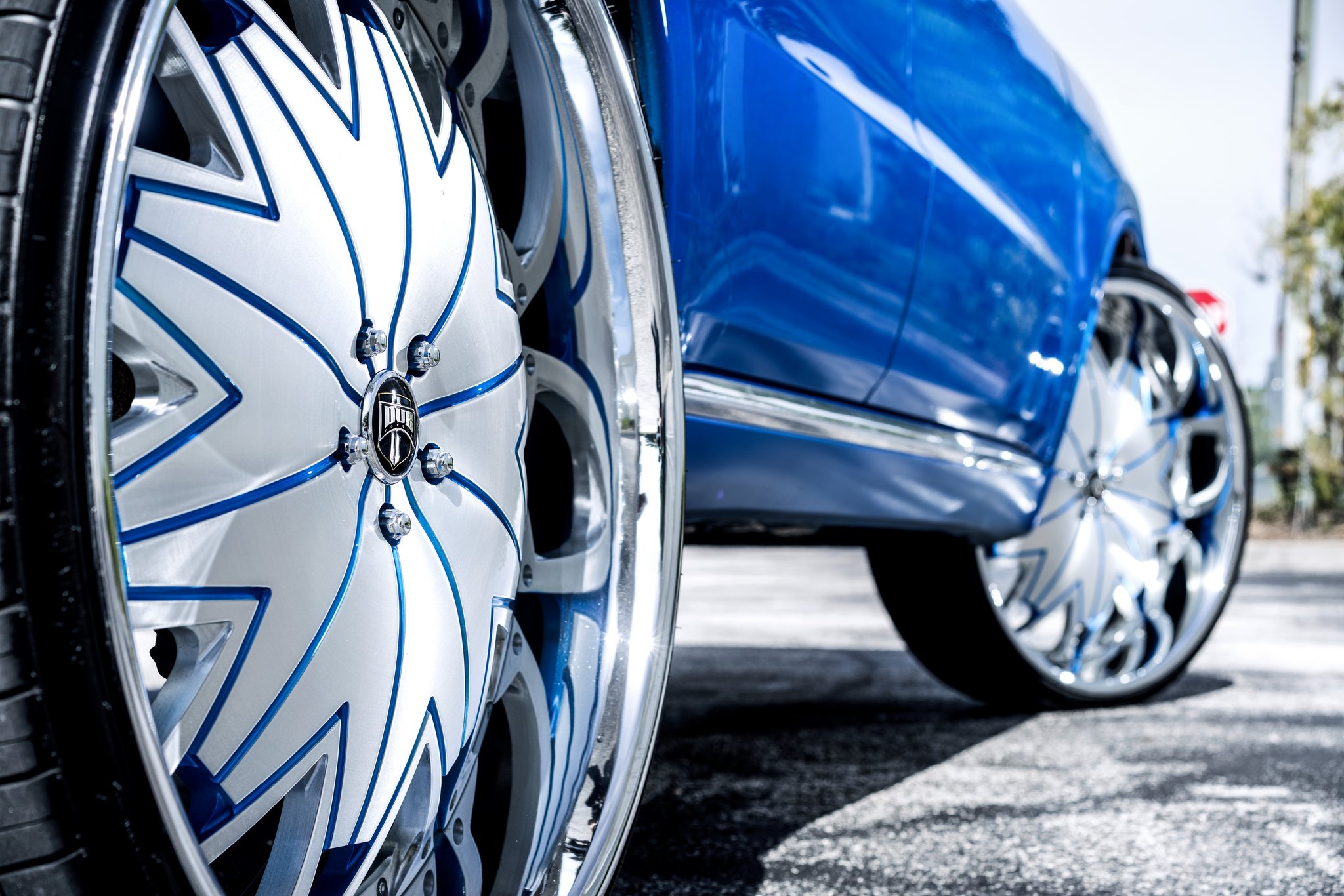 Custom DUB Wheels with Blue Elements on Dodge Durango - Photo by DUB