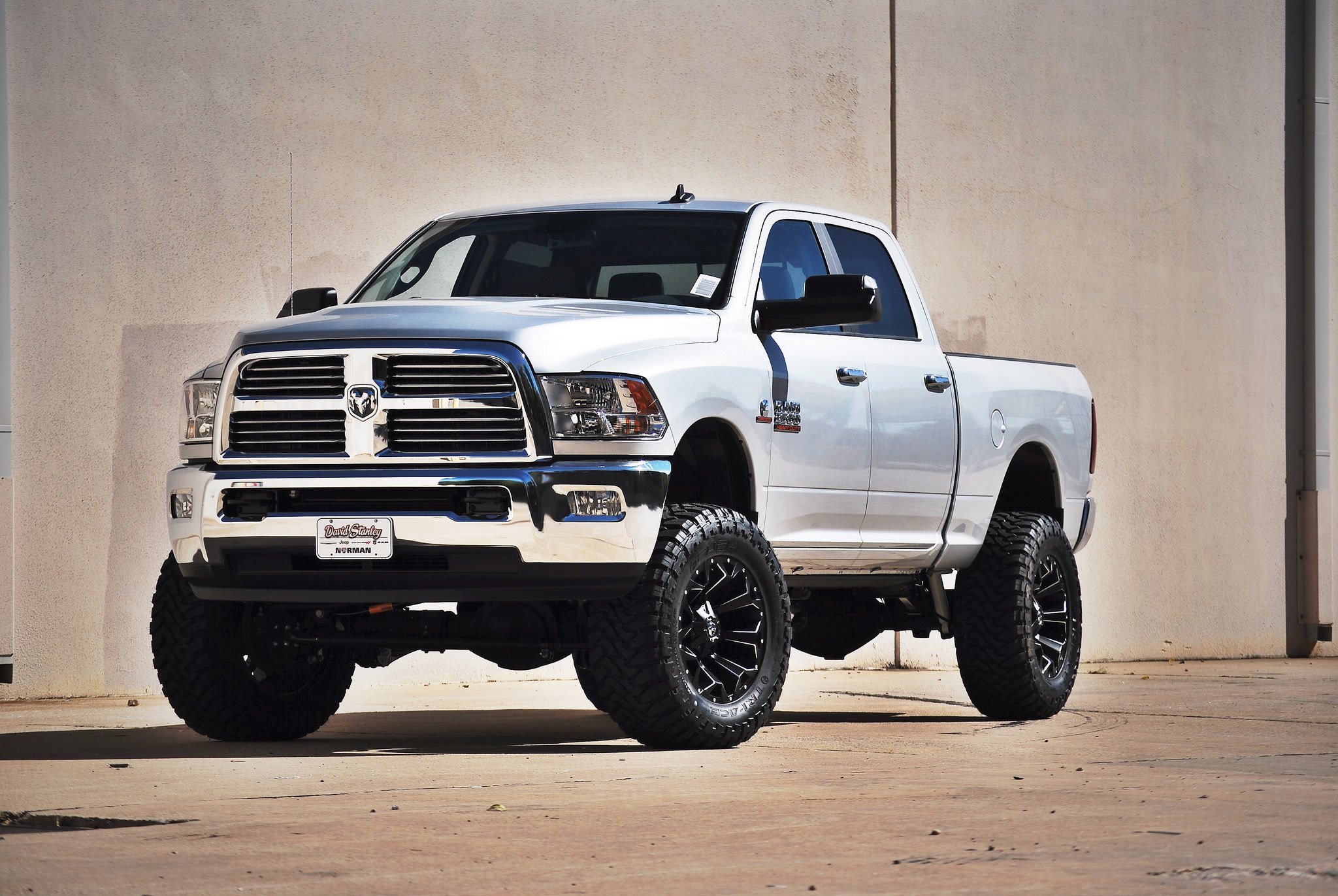 White Dodge Ram 2500 with 6 Inch Lift Kit - Photo by Fuel Offroad