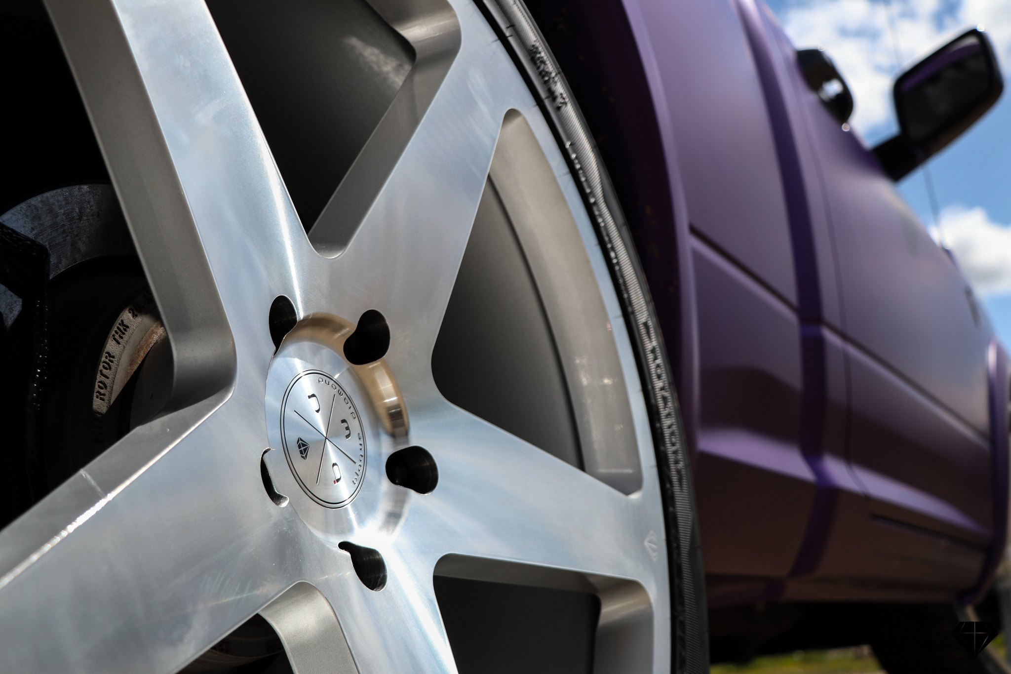 Silver Blaque Diamond Wheels on Custom Purple Dodge Ram - Photo by Blaque Diamond Wheels