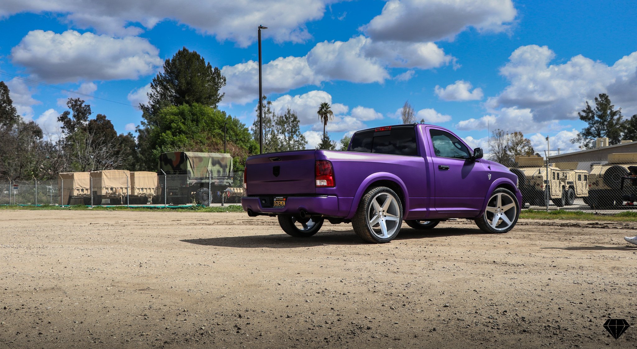 Matte Purple Dodge Ram with Custom Rear Bumper - Photo by Blaque Diamond Wheels
