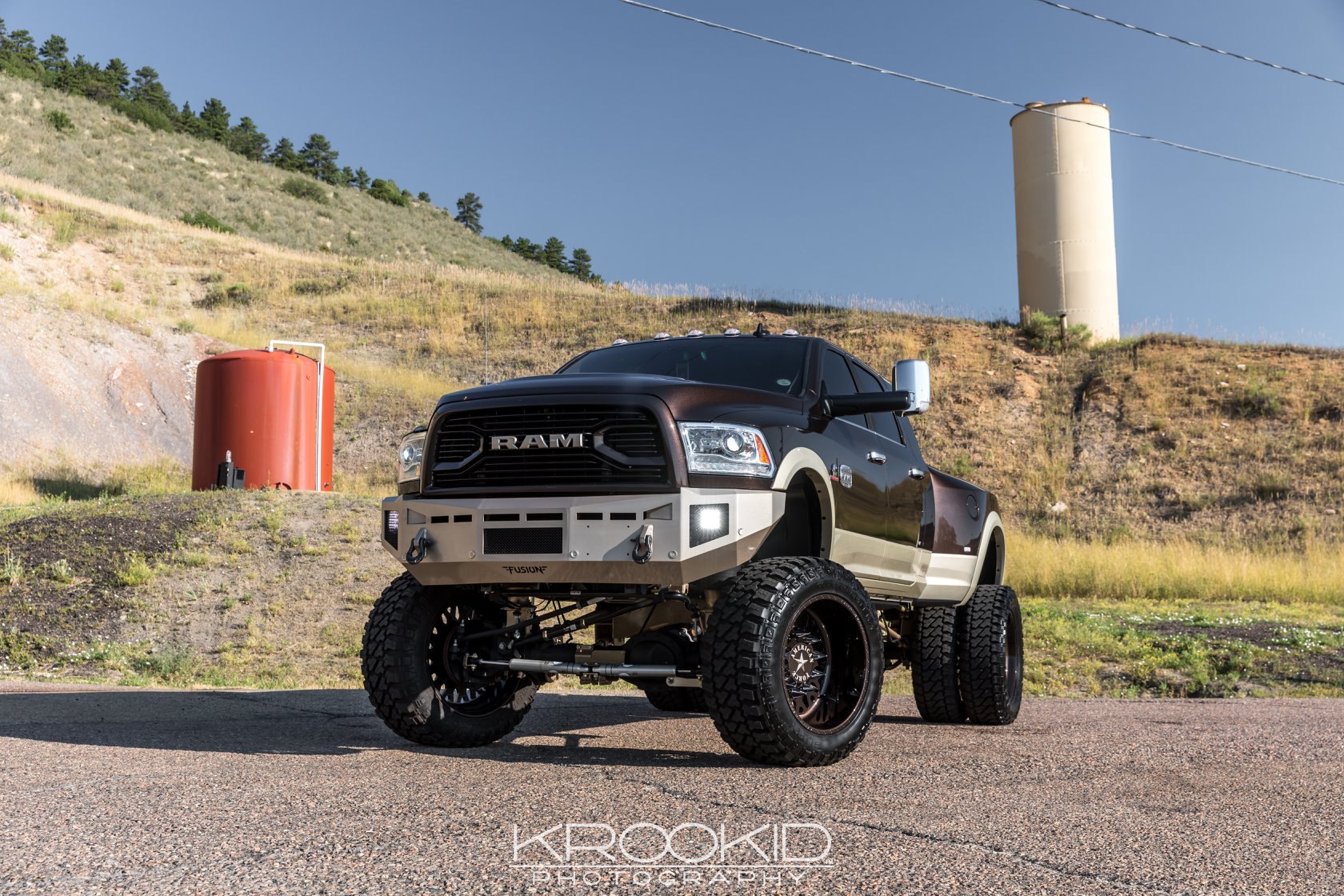 Custom Projector Headlights on Brown Lifted Dodge Ram - Photo by Krookid Photography