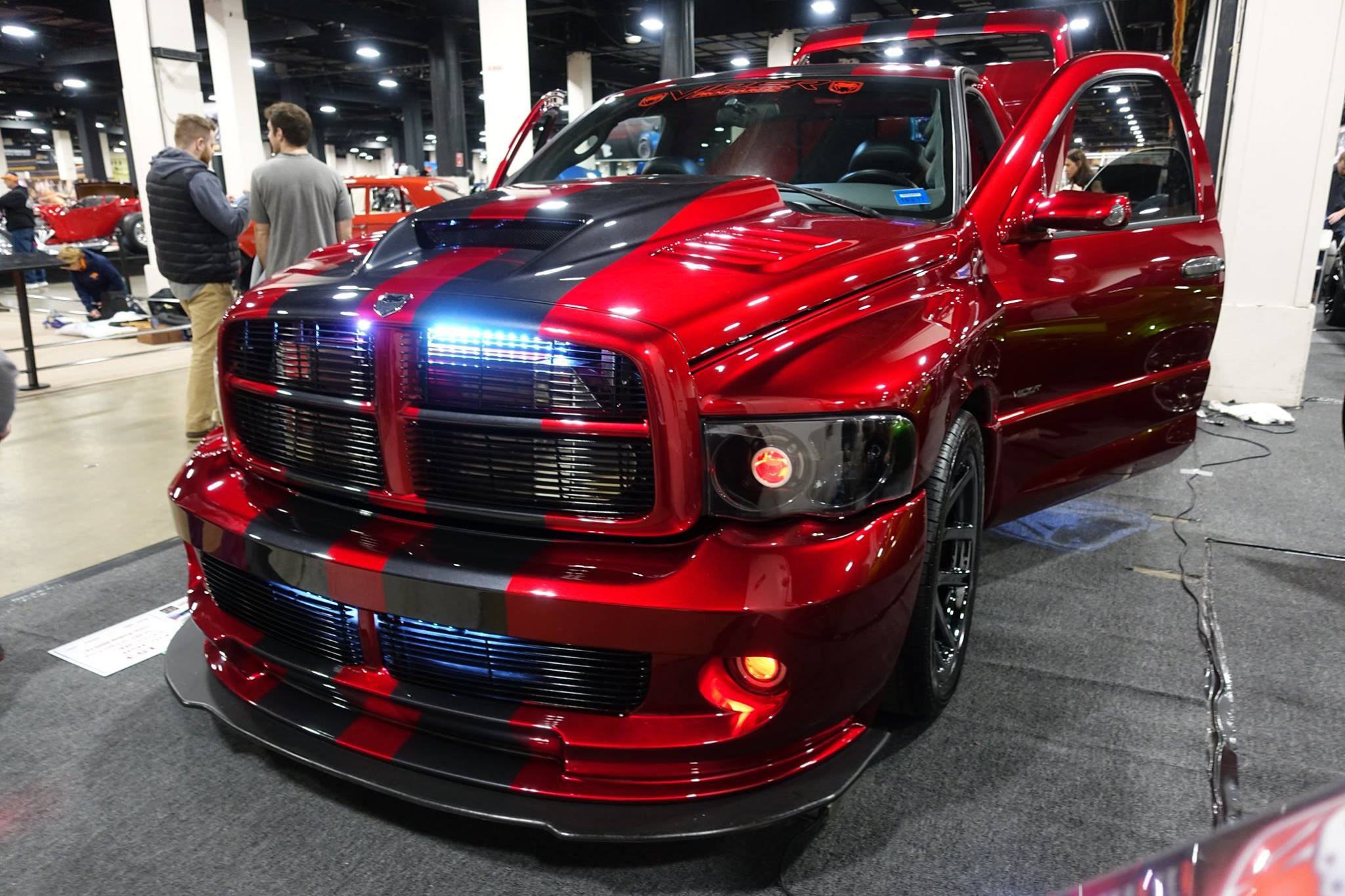 Red Dodge Ram with Aftermarket Vented Hood - Photo by Viper Truck Procharged