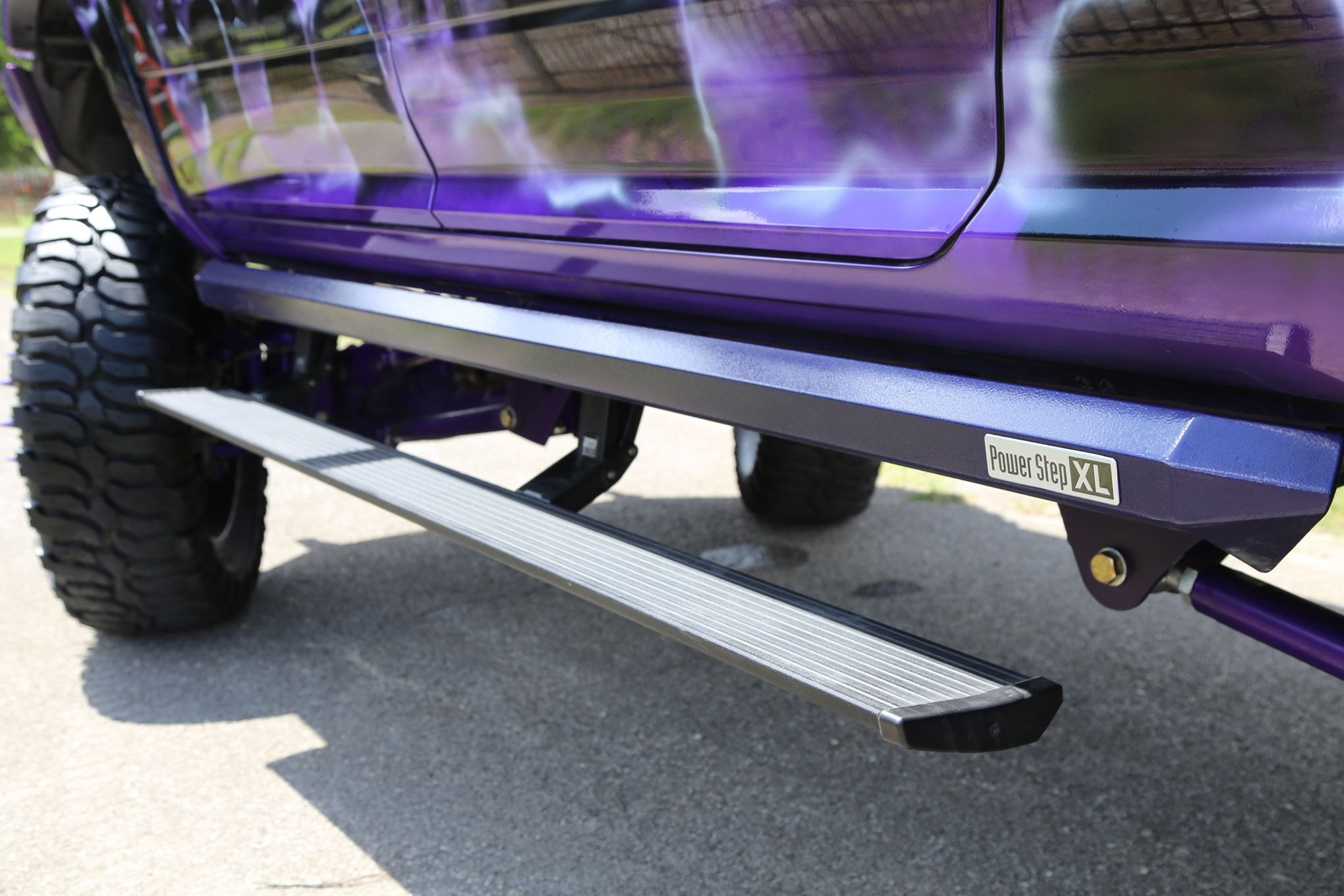 Purple Airbrushed Dodge Ram with Retractable Steps - Photo by Travis Haecker, Chris Castaneda