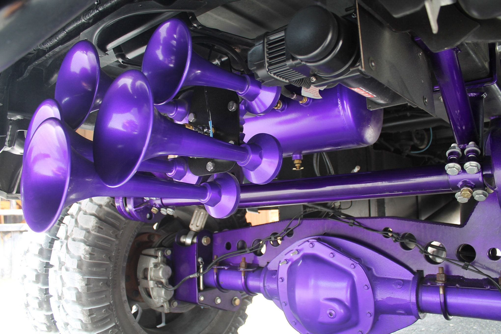Custom Horn System on Purple Airbrushed Dodge Ram - Photo by Travis Haecker, Chris Castaneda