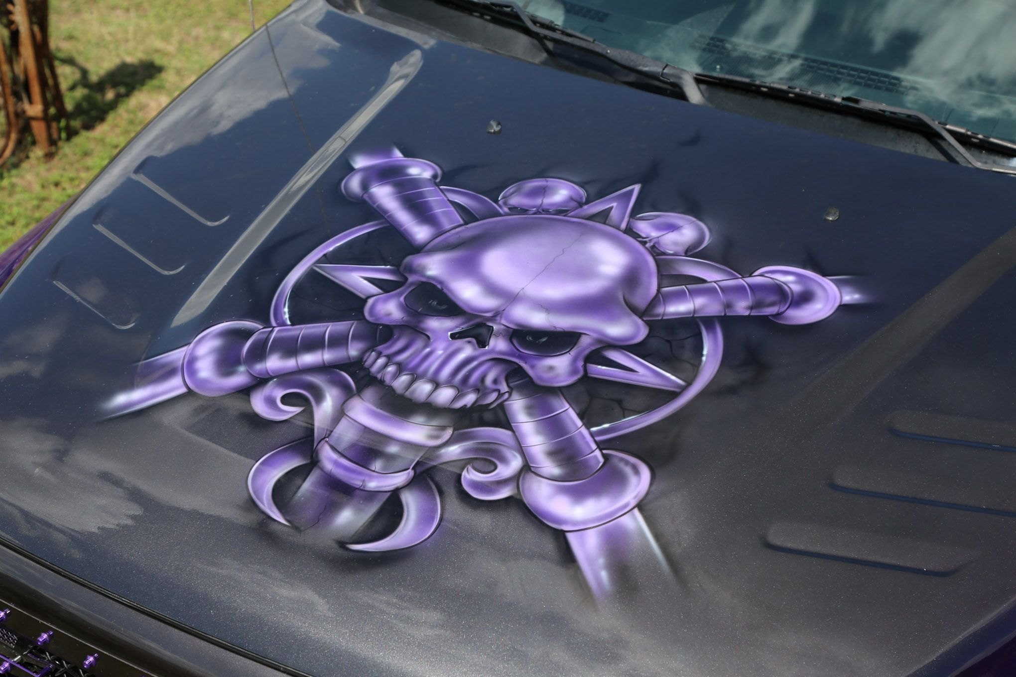 Purple Lifted Dodge Ram with Aftermarket Airbrushed Hood - Photo by Travis Haecker, Chris Castaneda