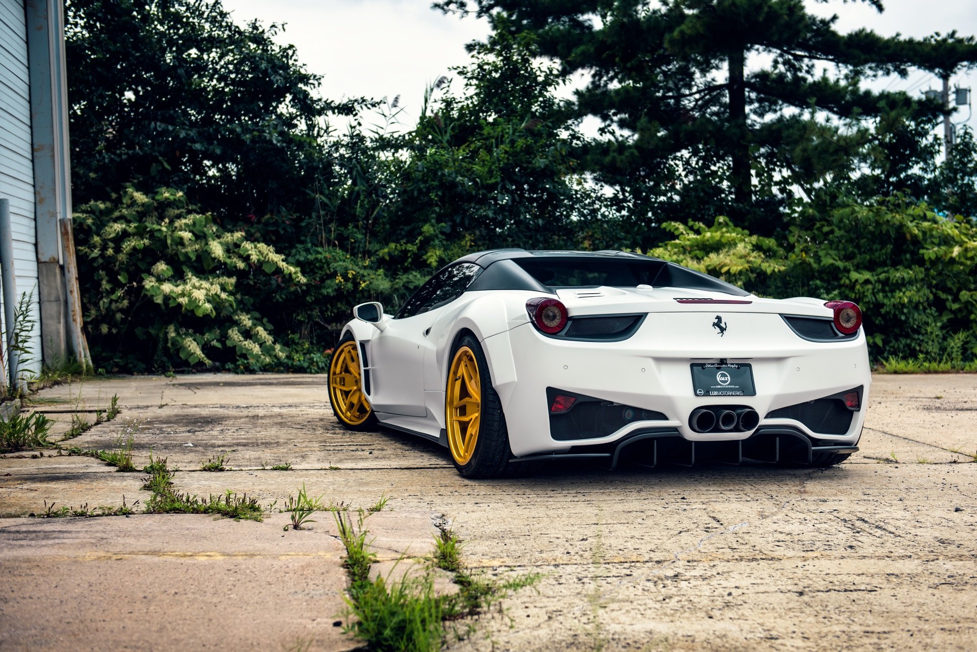 White Convertible Ferrari 458 with Aftermarket Rear Diffuser - Photo by DUB Magazine