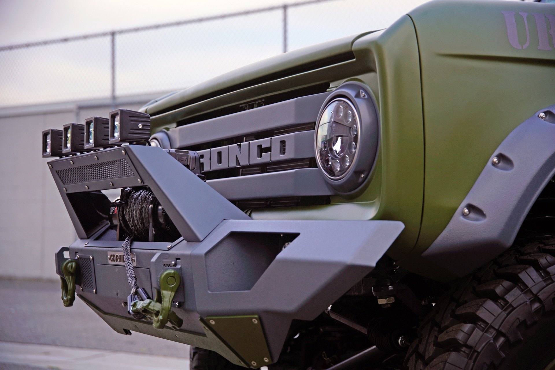 Green Ford Bronco with Dark Smoke Headlights - Photo by Dropstar