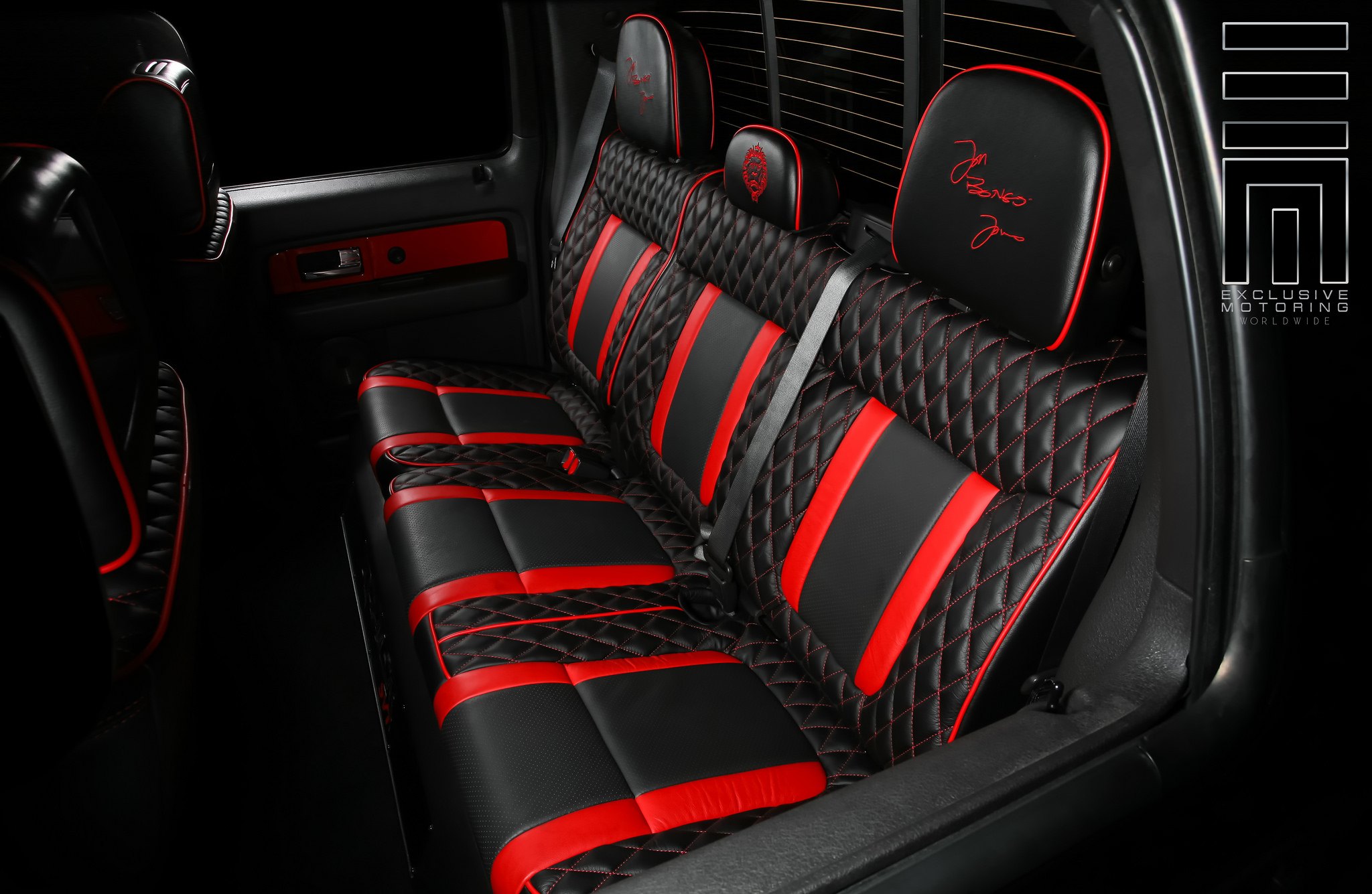Black And Red Stitched Leather Seats - Photo by Exclusive Motoring