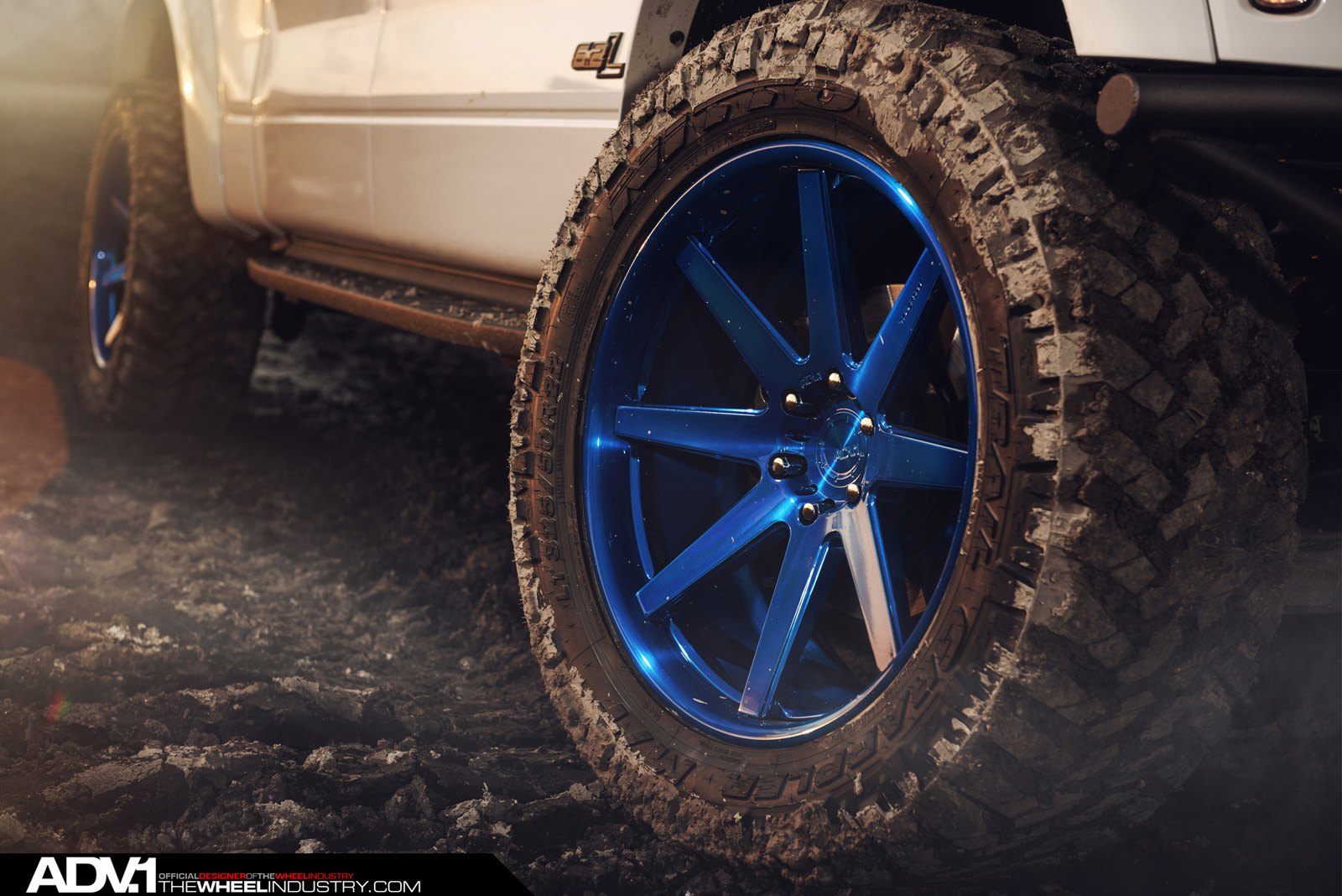 Nitto Tires on White Lifted Ford F-150 - Photo by ADV.1