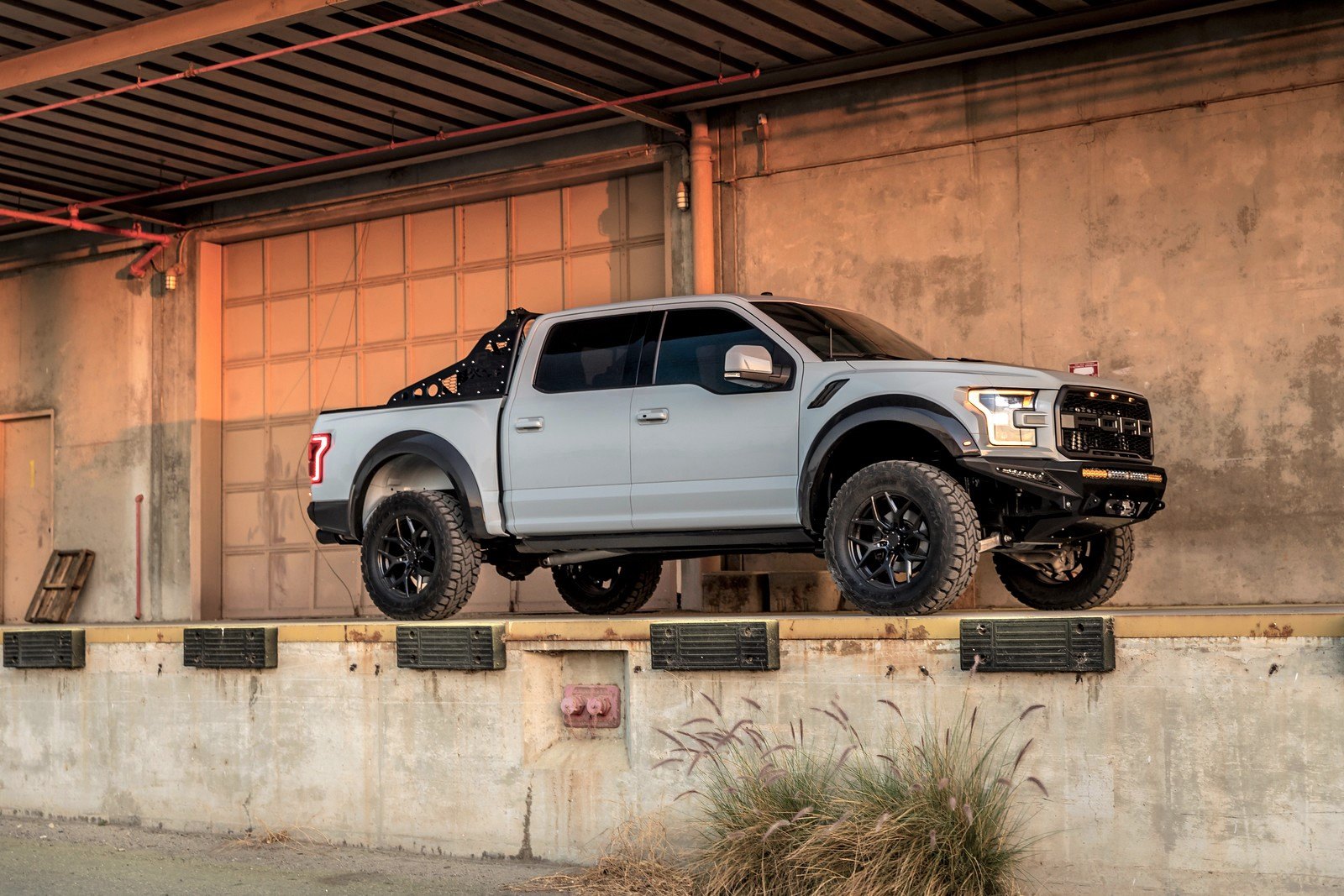 Gray Lifted Ford F-150 with Aftermarket Side Mirrors - Photo by Vorsteiner