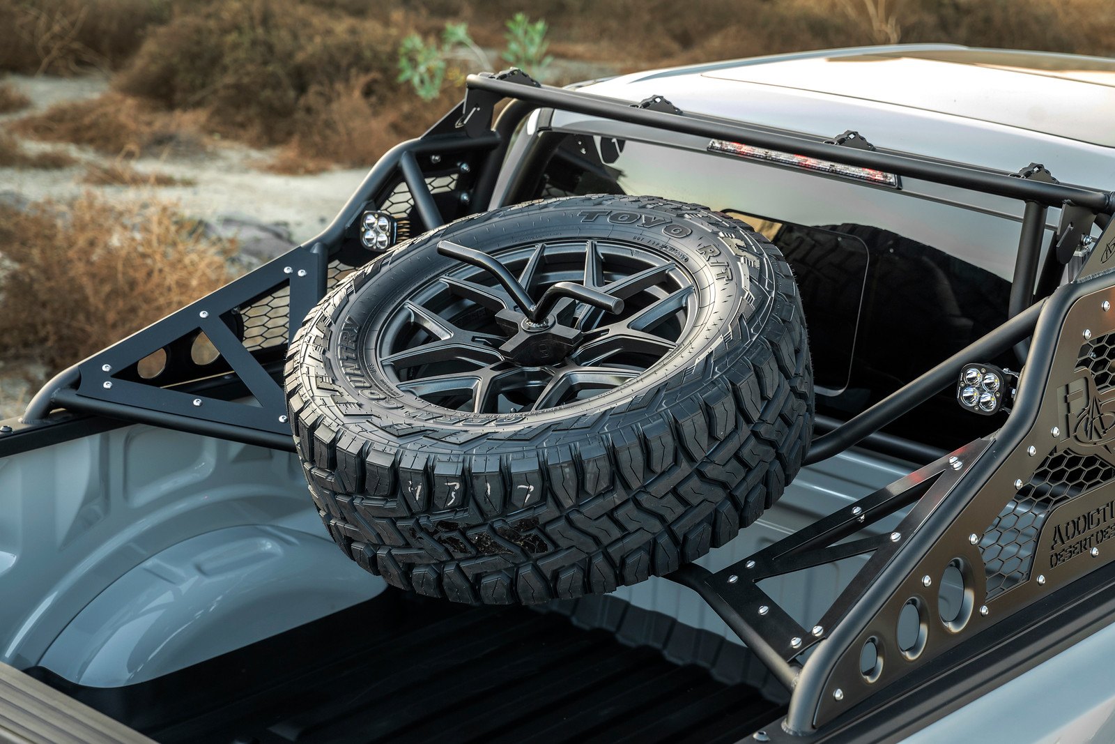 Gray Lifted Ford F-150 with Toyo Spare Tire - Photo by Vorsteiner
