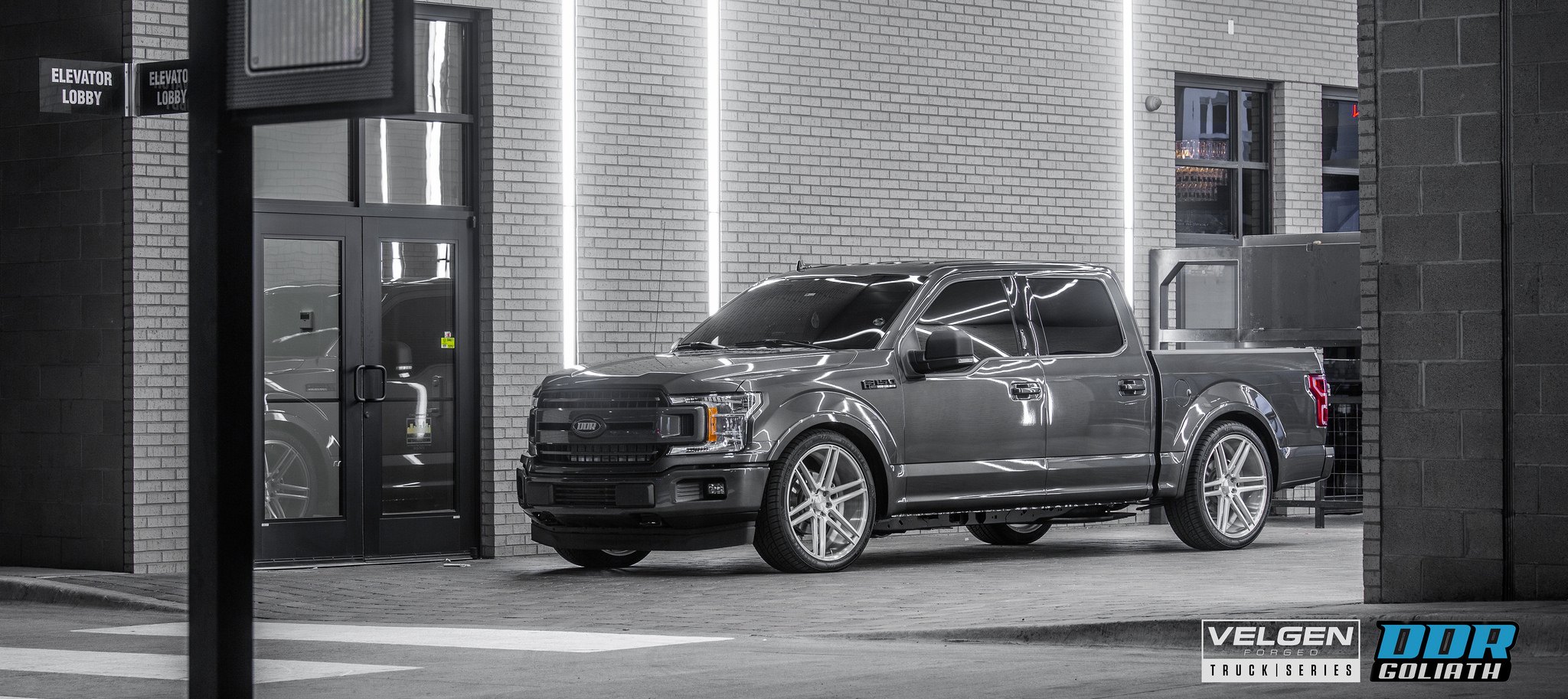 Gray Ford F-150 with Custom Projector Headlights - Photo by Velgen