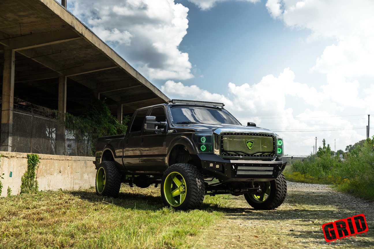 Lifted Ford F250 With Green LED Headlights - Photo by Grid Off-road
