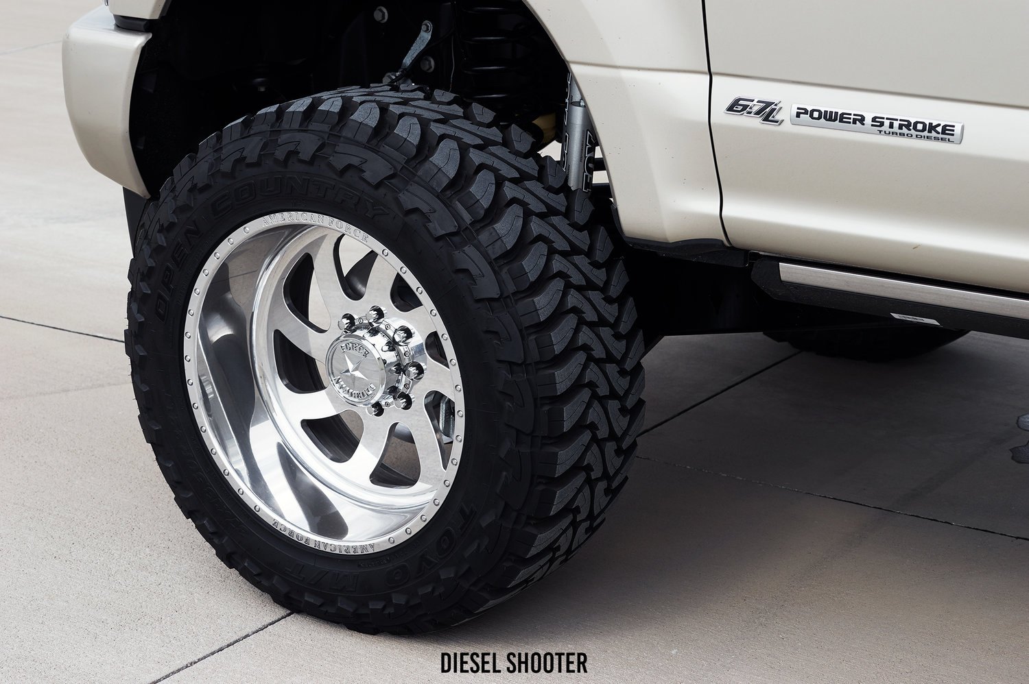 Lifted Ford Powerstroke on Custom Wheels - Photo by Diesel Shooter