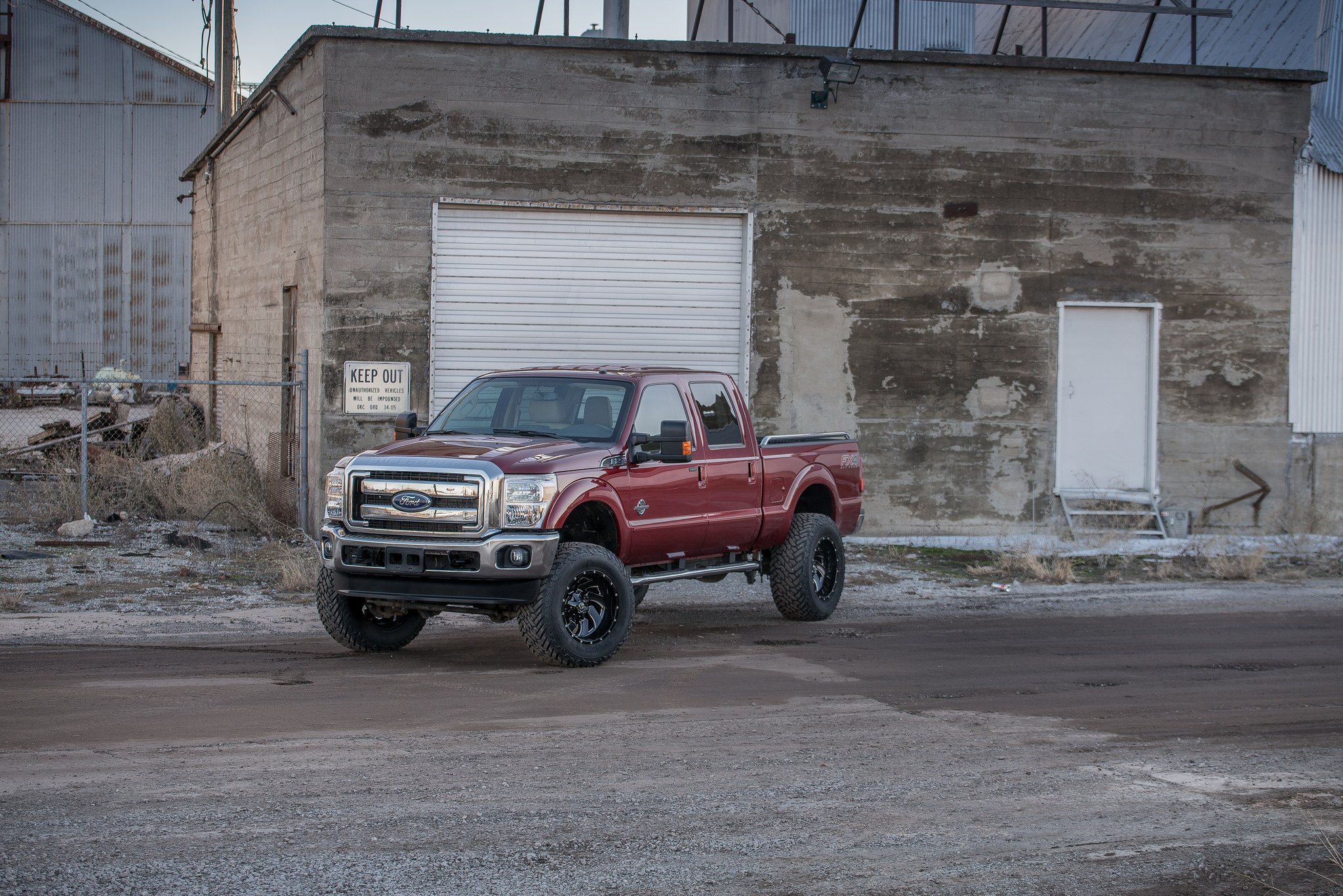 Custom Red Lifted Ford F-250 FX4 - Photo by Fuel Offroad