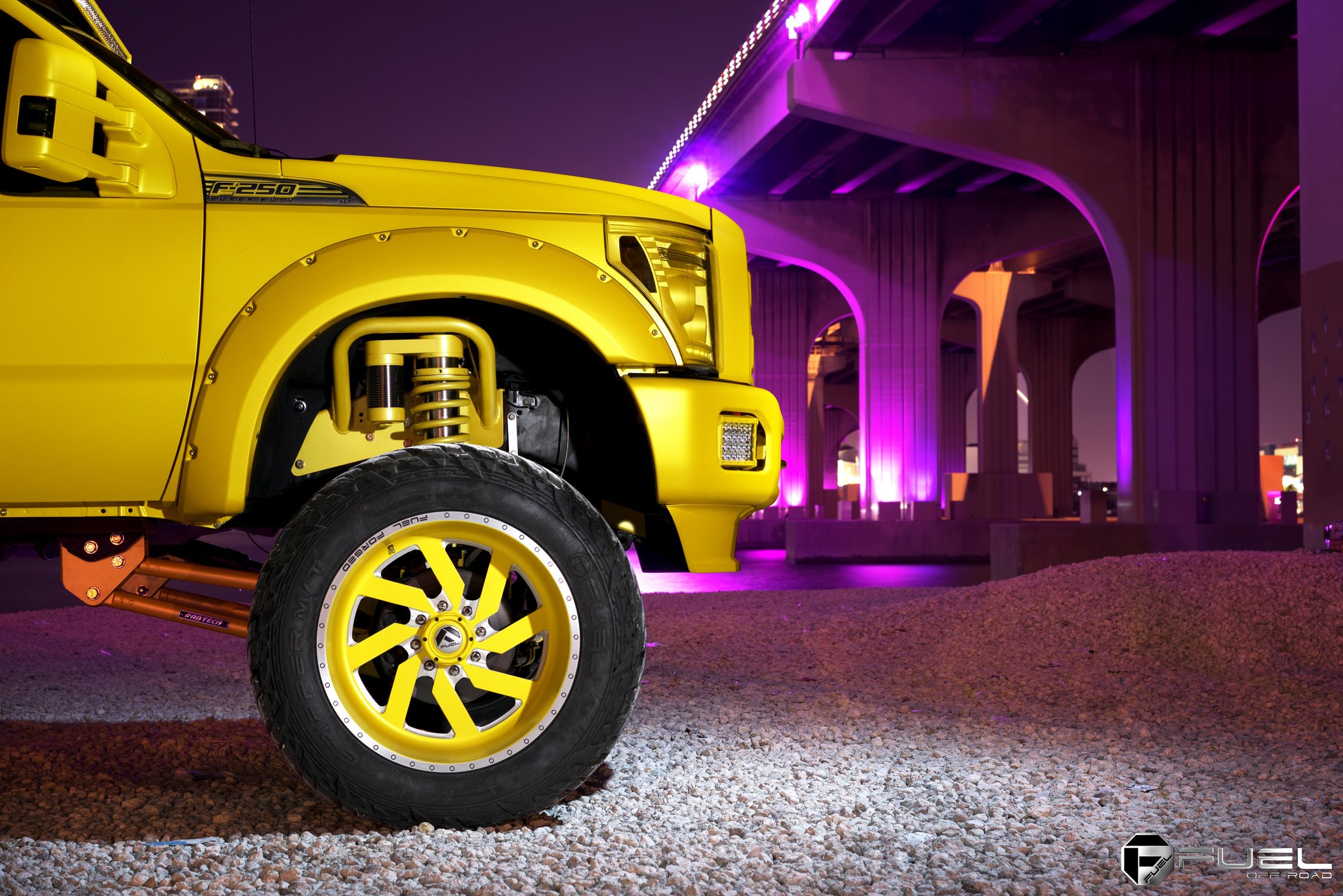 Yellow Ford F-250 with Custom Lift Kit - Photo by Fuel Offroad