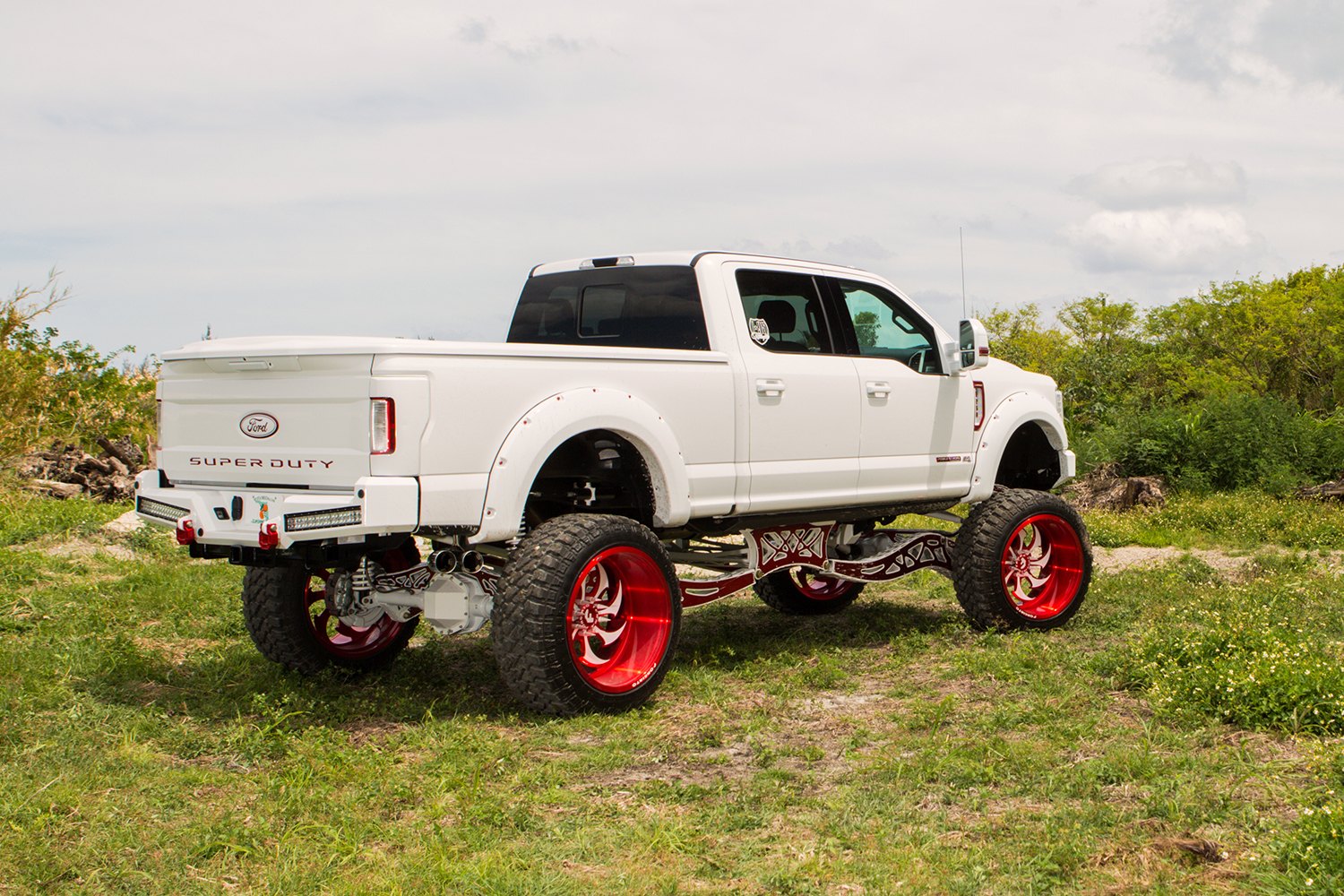 Off-Road Rear Bumper on White Lifted Ford F-250 - Photo by Forgiato