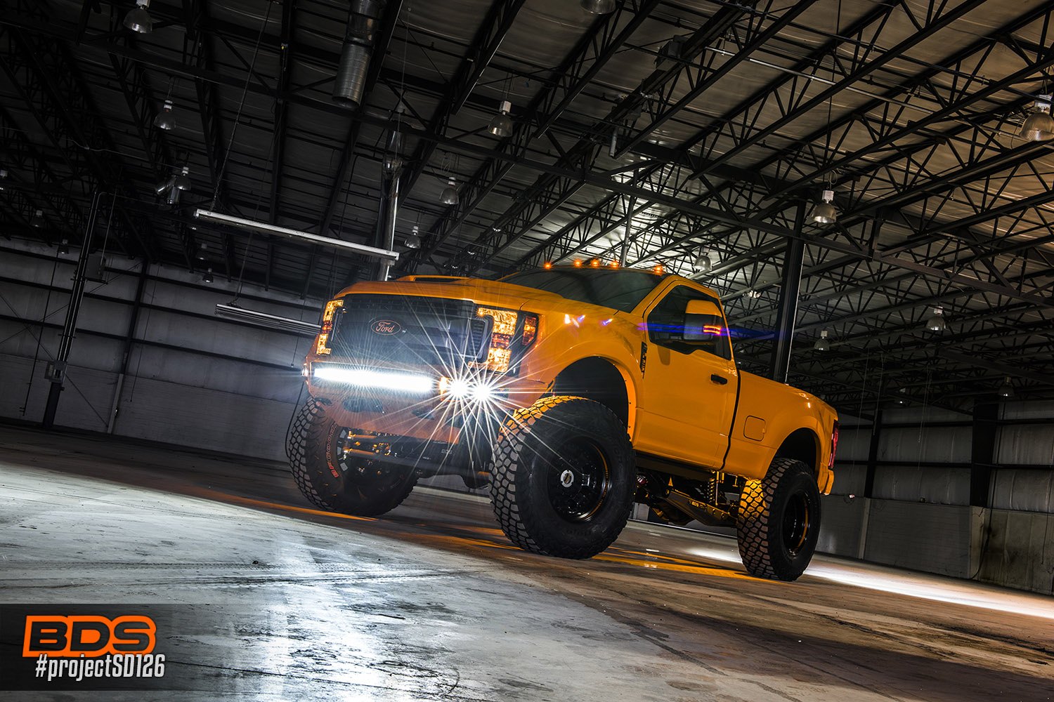 Orange Lifted Ford F-250 with Off-Road Front Bumper - Photo by BDS Suspension
