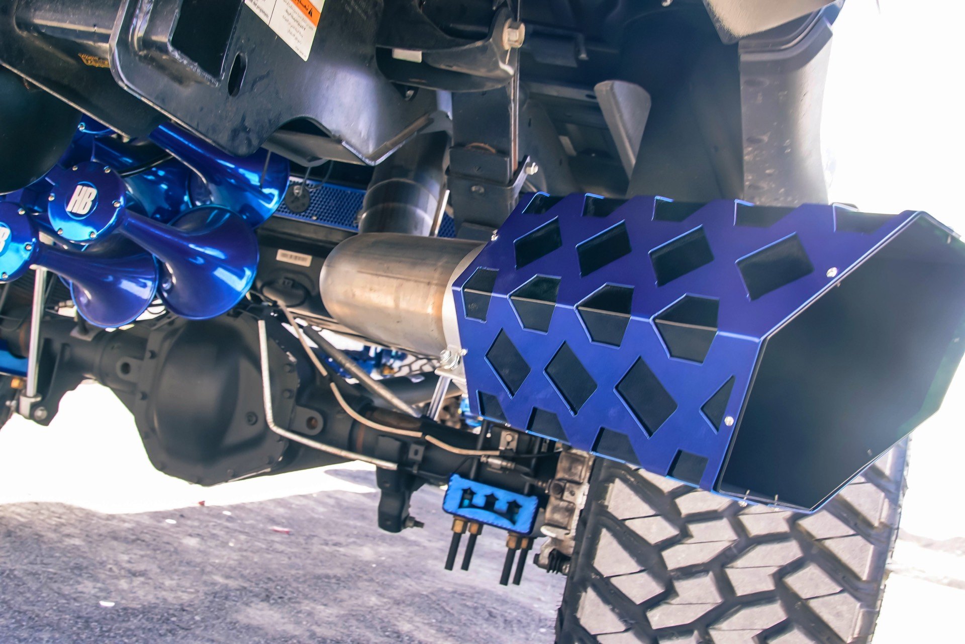 Custom HB Exhaust System on Black Lifted Ford F-250 - Photo by TIS Wheels