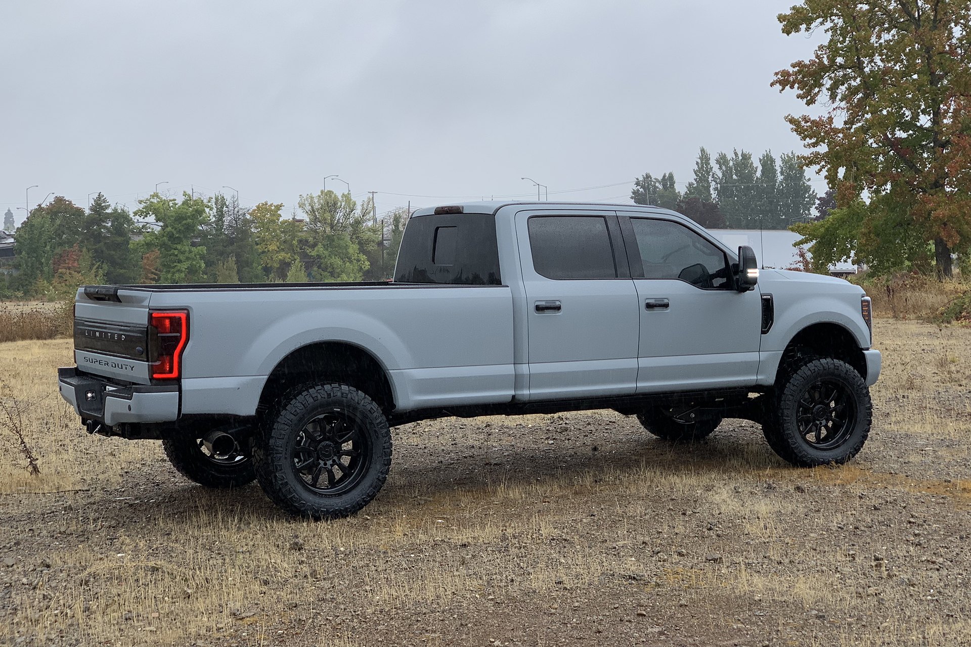 Custom Red LED Taillights on Gray Lifted Ford F-250 - Photo by Forgiato
