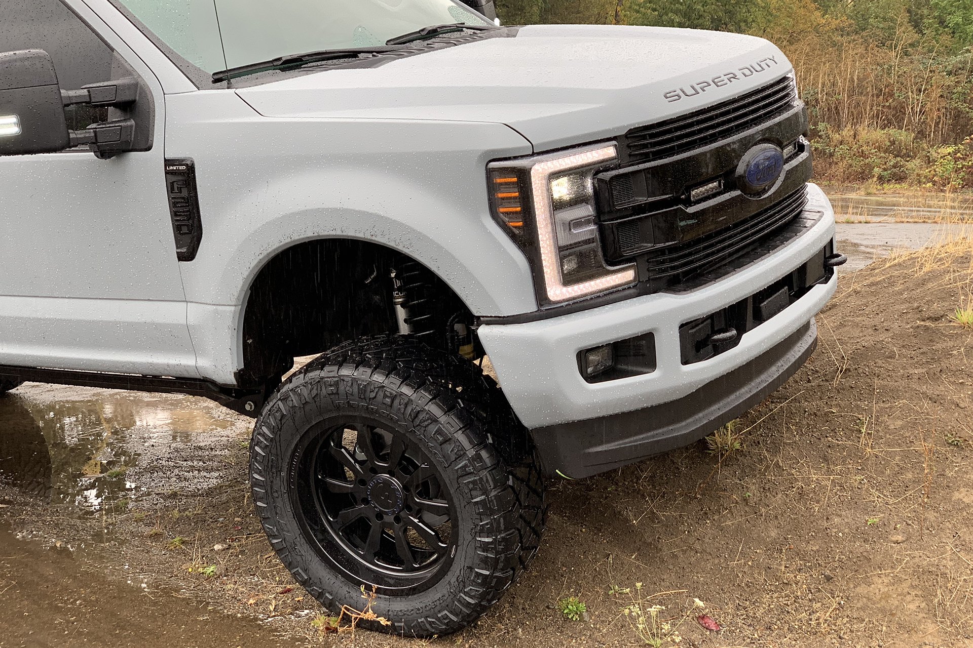 Nitto Tires on Custom Gray Lifted Ford F-250 - Photo by Forgiato