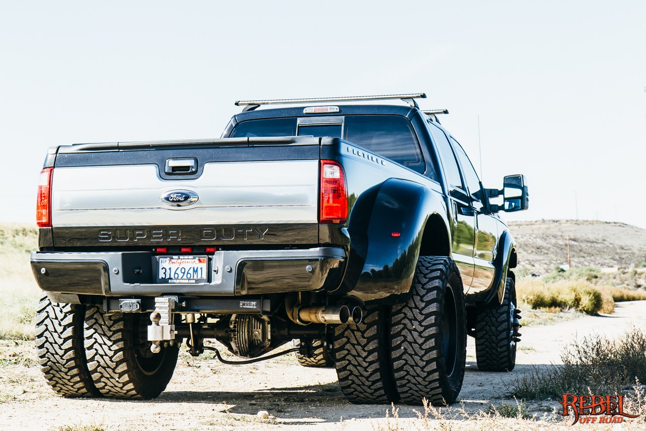 Red LED Taillights on Black Lifted Ford F-350 Super Duty - Photo by Rebel Off-Road