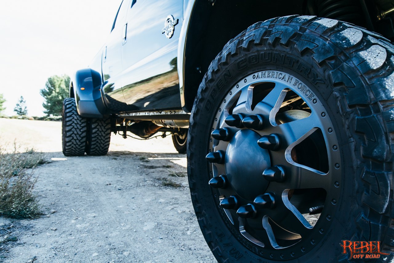 Black Lifted Ford F-350 with Custom American Force Wheels - Photo by Rebel Off-Road