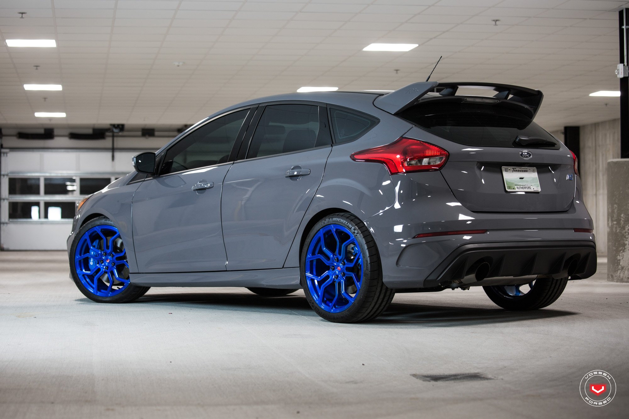 Gray Ford Focus with Large Roofline Spoiler - Photo by Vossen