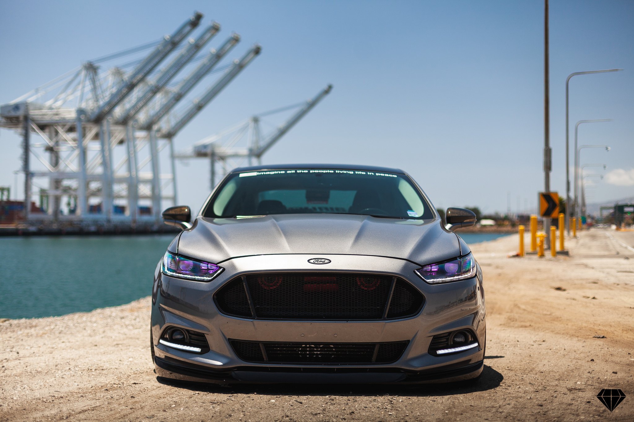 Front Bumper with LED Lights on Silver Ford Fusion - Photo by Blaque Diamond Wheels
