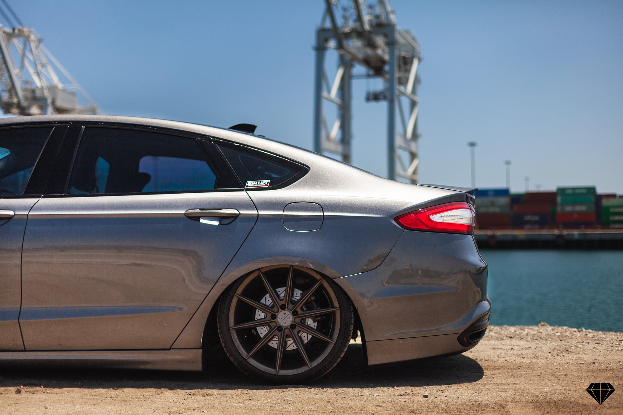 Silver Stanced Ford Fusion with Custom Wheels - Photo by Blaque Diamond Wheels