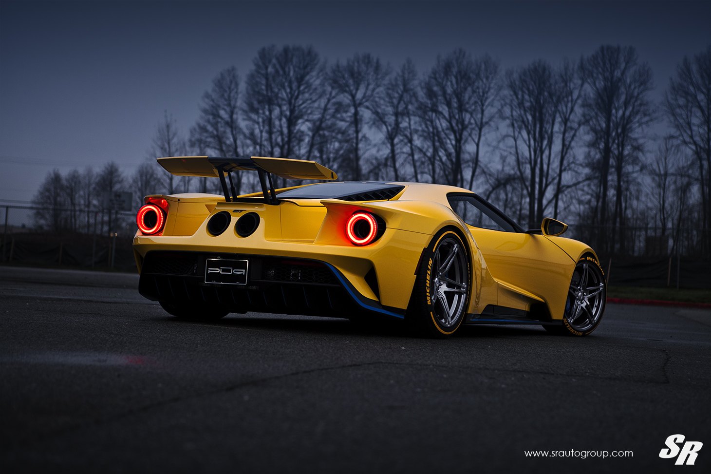 Large Wing Spoiler on Yellow Ford GT - Photo by SR Auto Group