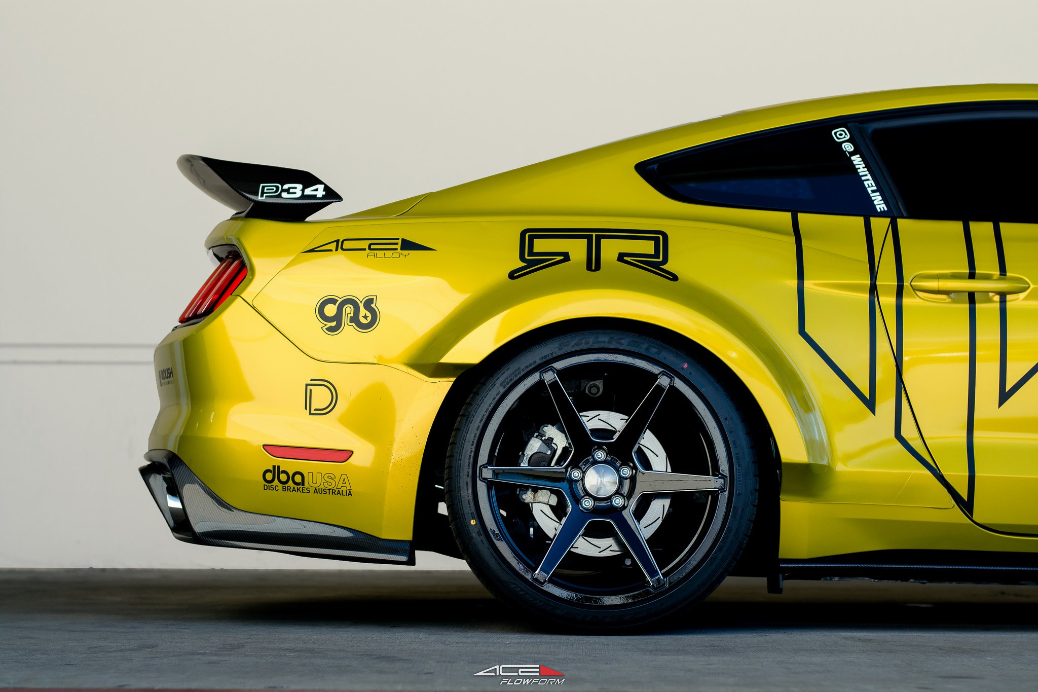 Carbon Fiber Rear Spoiler on Yellow Ford Mustang - Photo by Ace Alloy